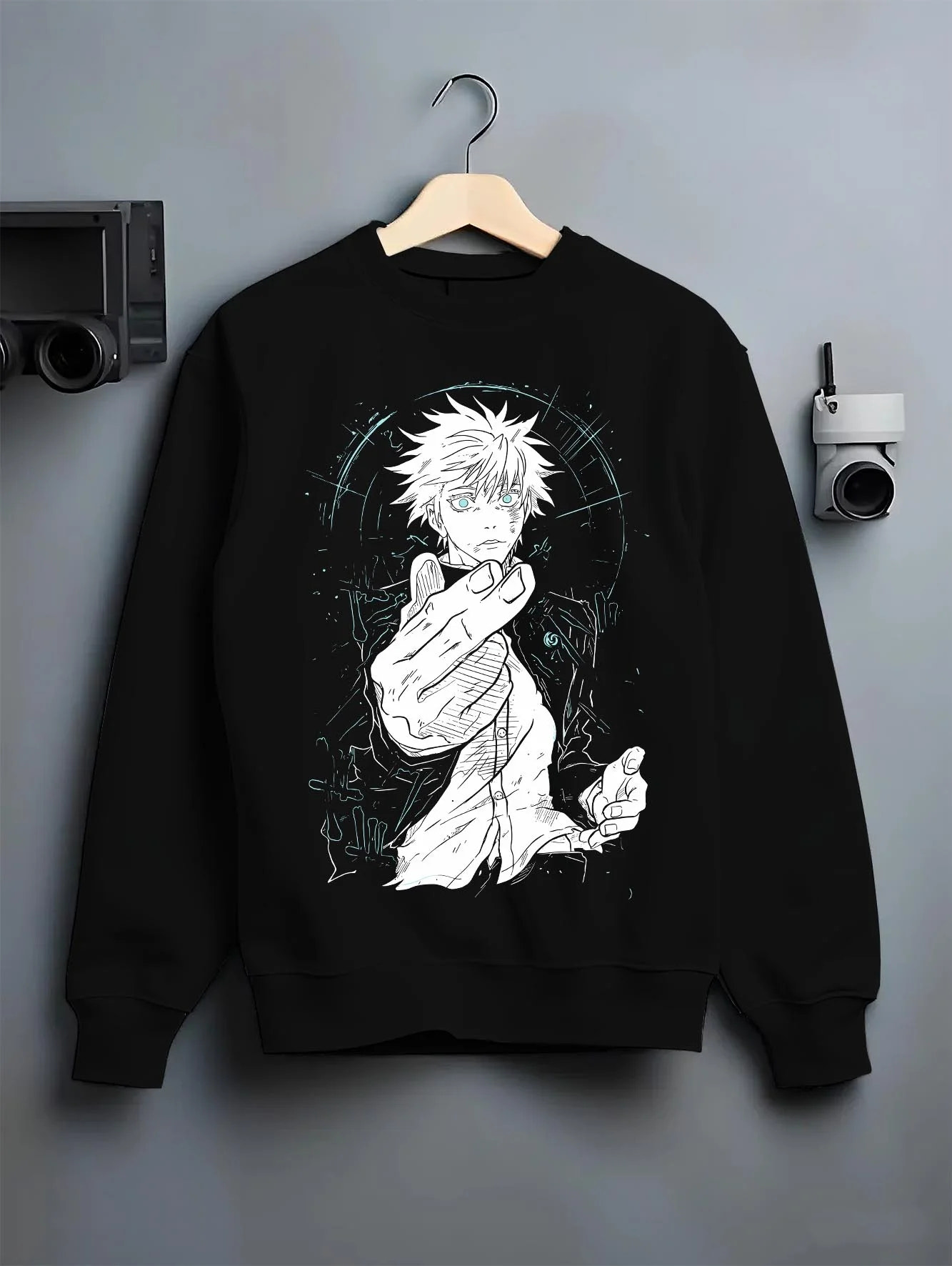 Black crewneck sweatshirt on hanger with Jujutsu Kaisen Hoodie Satoru Gojo Dark Energy Jumper graphic premium wear.