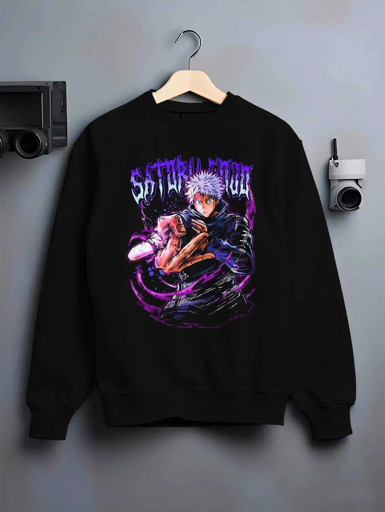 Black crewneck sweatshirt on hanger with Jujutsu Kaisen Hoodie Satoru Gojo Hero Pose Jumper graphic streetwear graphic.