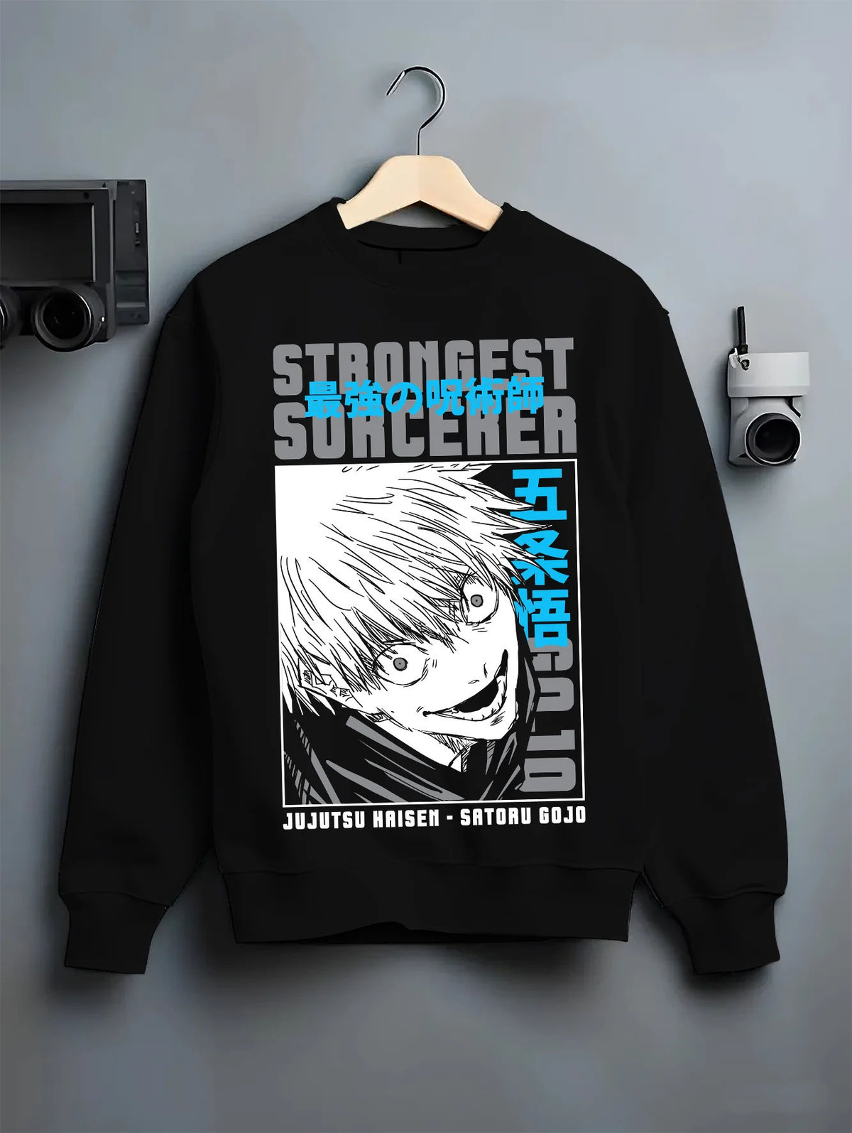 Black crewneck sweatshirt on hanger showing Satoru Gojo from Jujutsu Kaisen: strongest sorcerer manga close-up