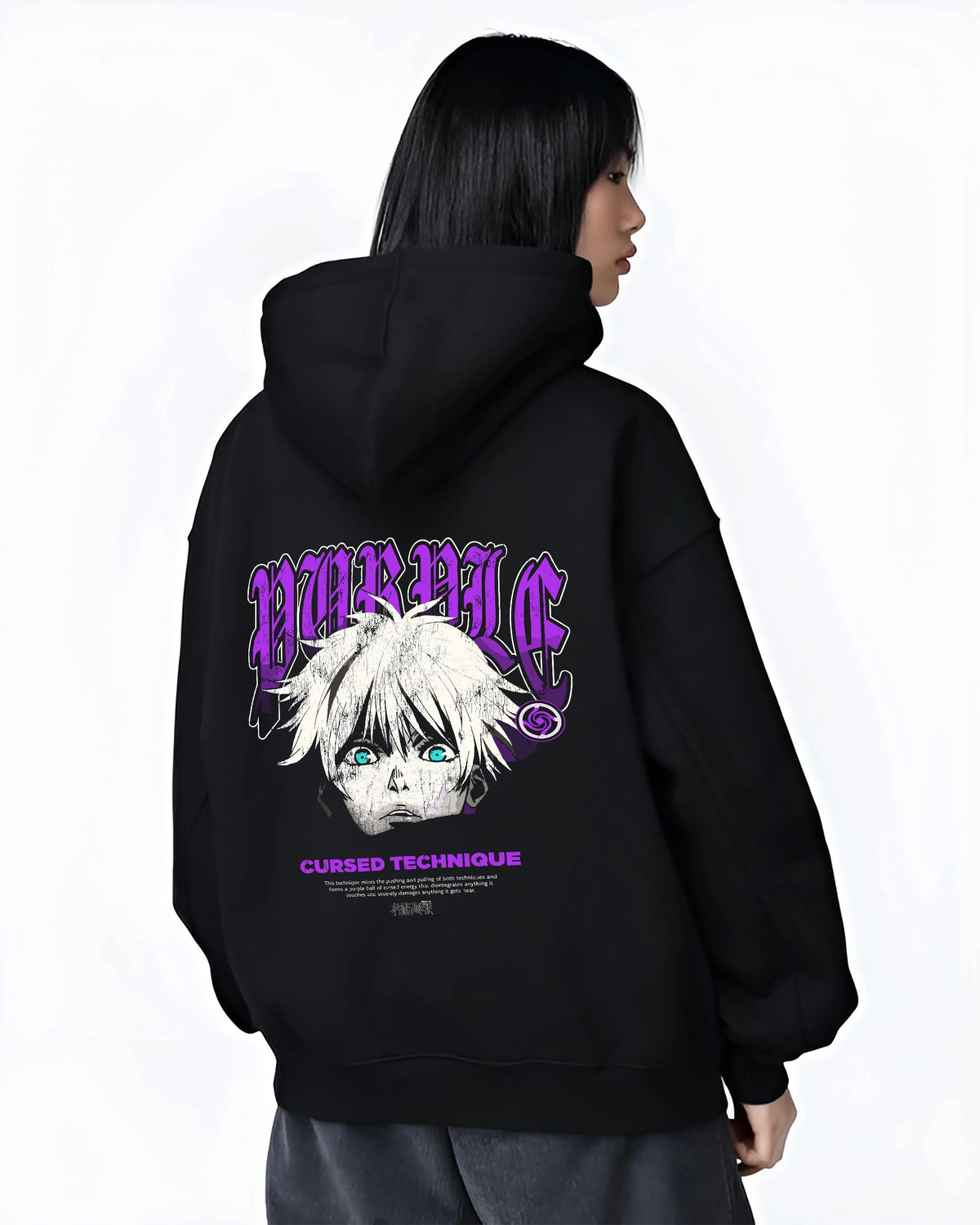 Black hoodie worn by female model from the back featuring Gojo Satoru cursed technique eyes artwork.