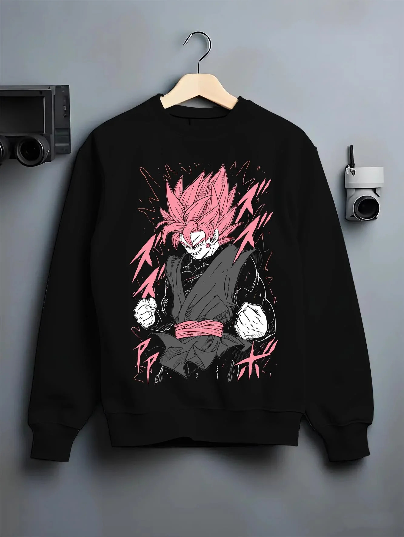 Black crewneck sweatshirt on hanger with Dragon Ball Z Hoodie Goku Black Rage Jumper graphic bold anime graphic.