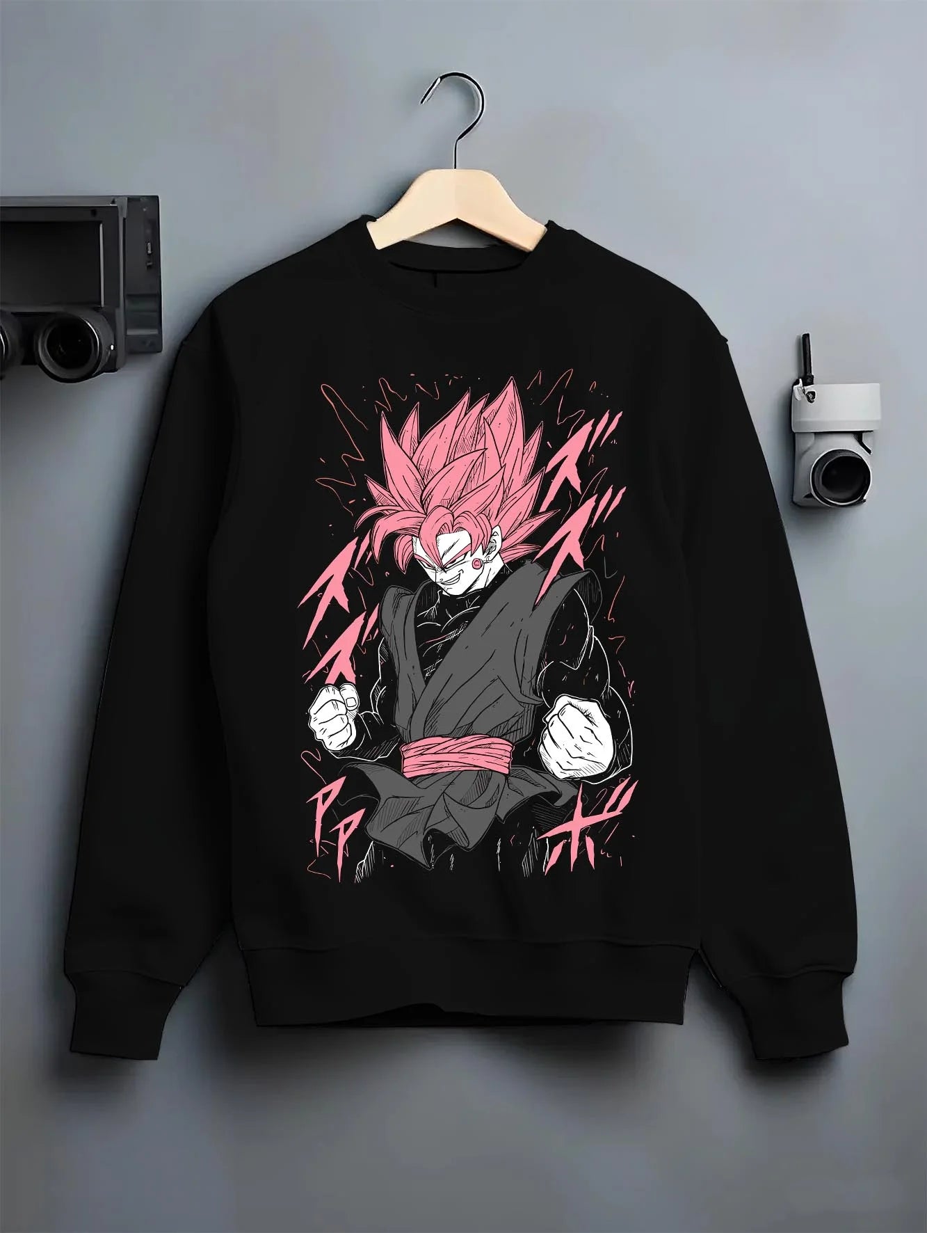 Black crewneck sweatshirt on hanger with Dragon Ball Z Hoodie Goku Black Rage Jumper graphic bold anime graphic.