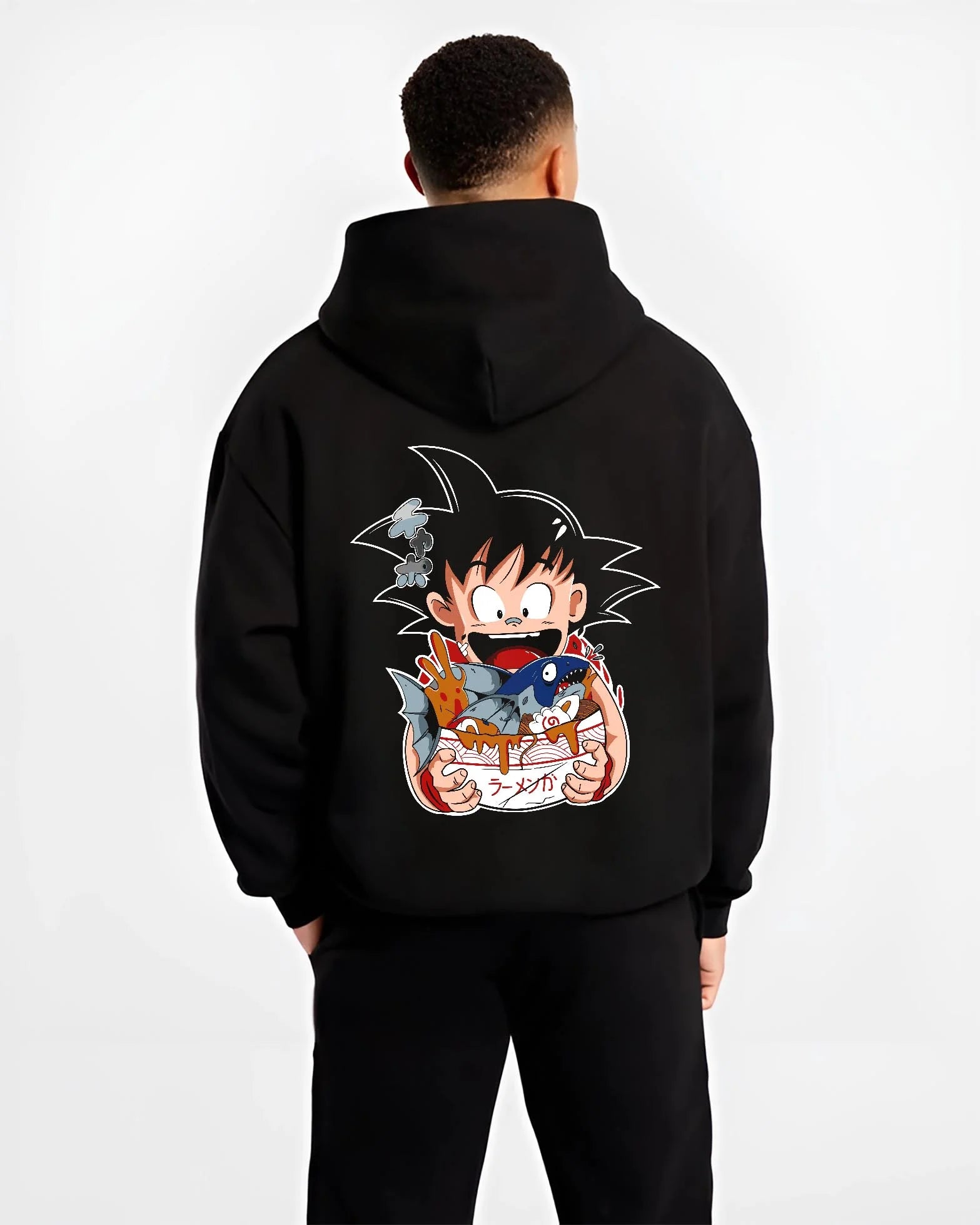 Black hoodie worn by male model, back view with Dragon Ball Z Hoodie Kid Goku Classic Jumper graphic streetwear graphic.