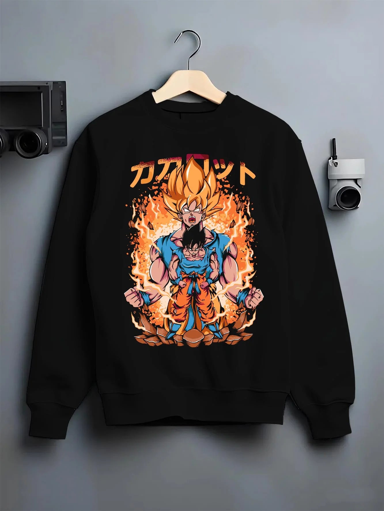 Black crewneck sweatshirt on hanger with Goku Hoodie Dragon Ball Z Super Saiyan Form Burst graphic bold anime graphic.