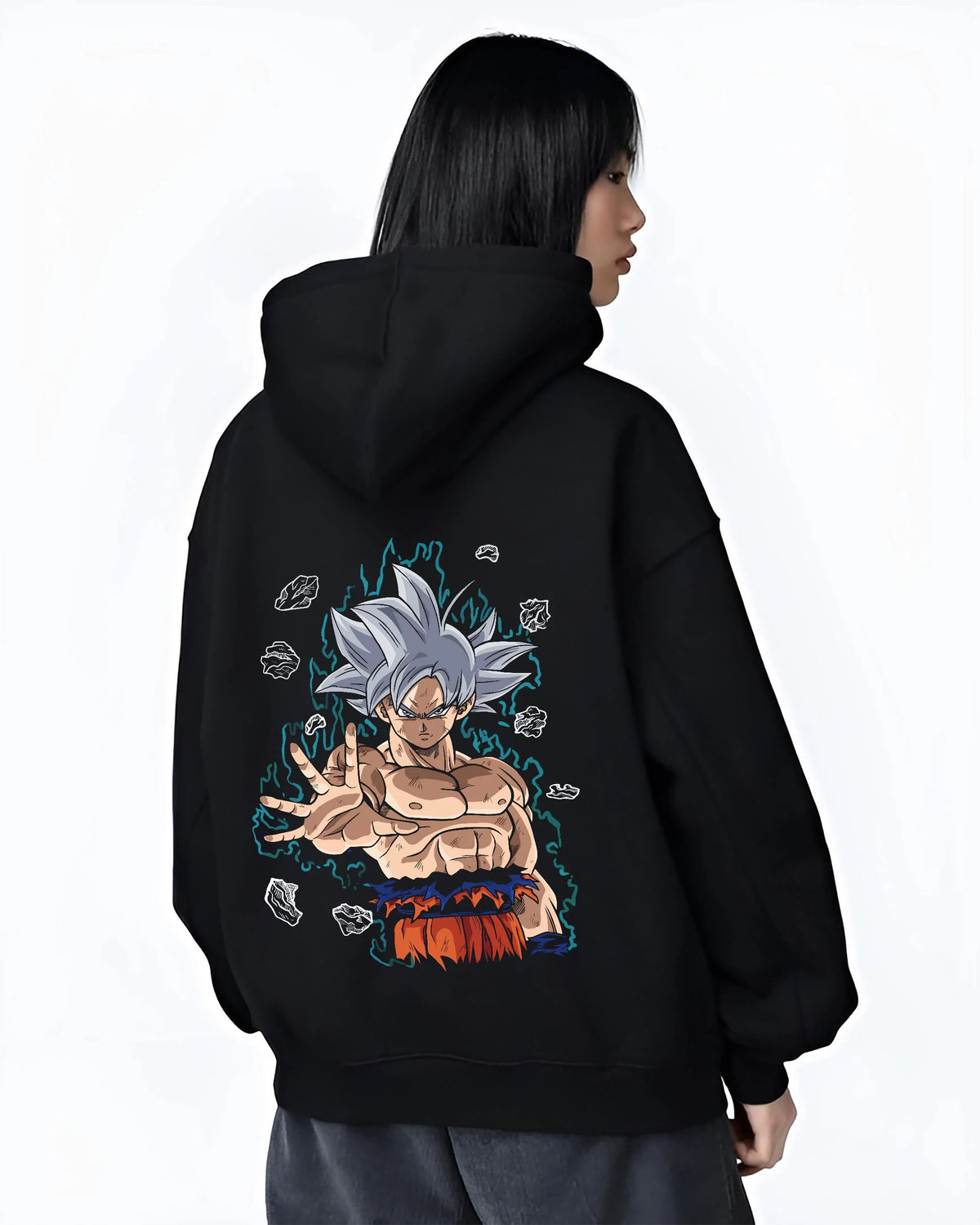 Black hoodie worn by female model from the back featuring Goku Ultra Instinct silver aura artwork.