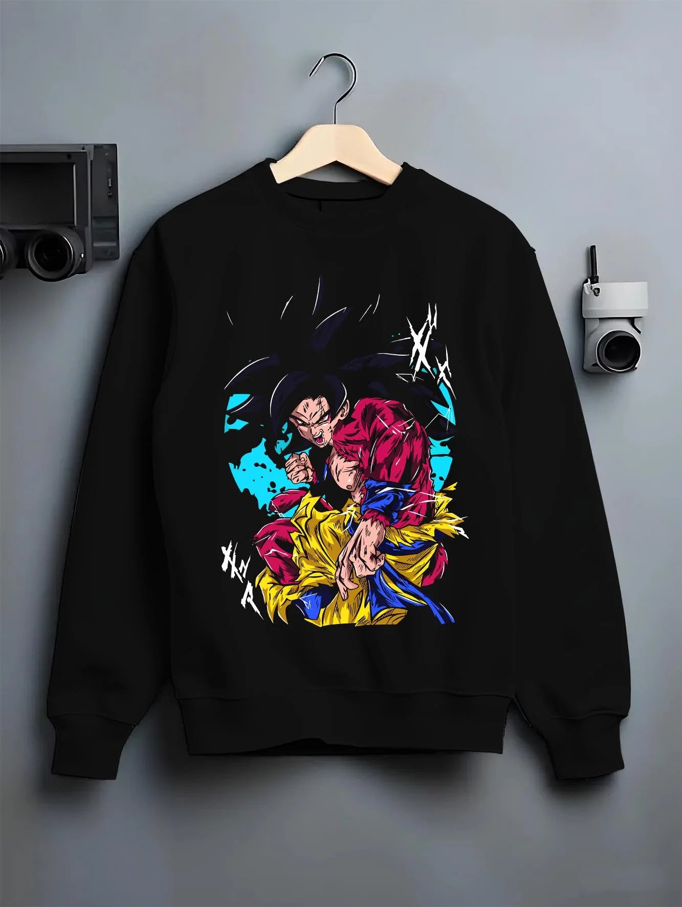 Black crewneck sweatshirt on hanger with Dragon Ball Z Hoodie Goku Super Saiyan 4 Power Jumper graphic Goku anime design.