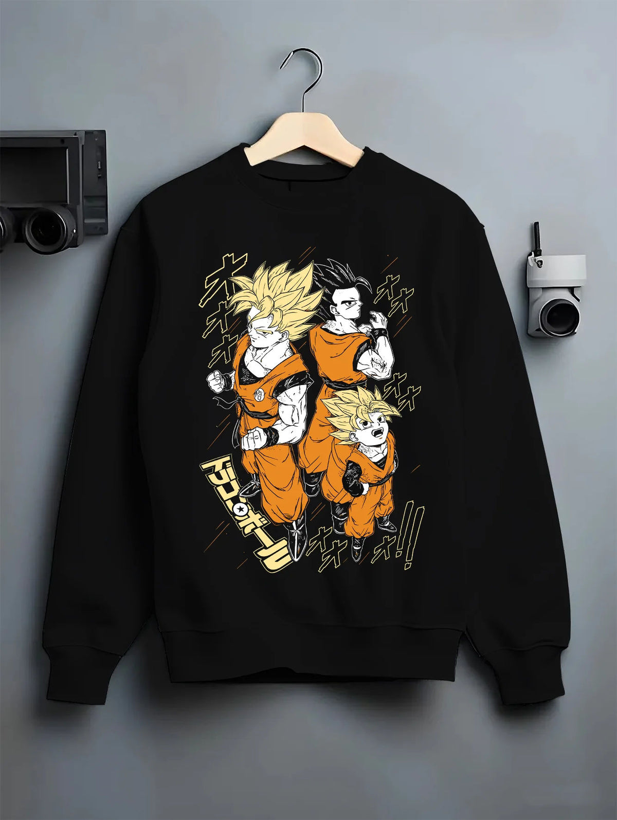 Black crewneck sweatshirt on hanger showing Son Goku and Gohan from Dragon Ball: three-form illustration