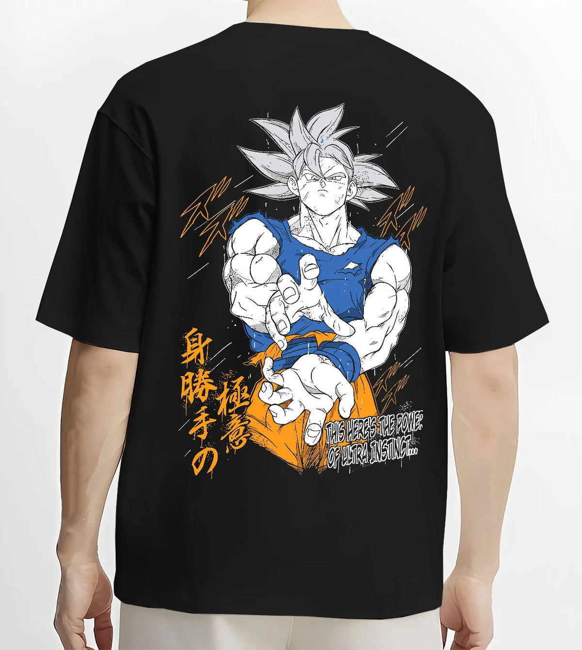 Black T-shirt model back view showing Son Goku from Dragon Ball: Ultra Instinct white-haired power pose