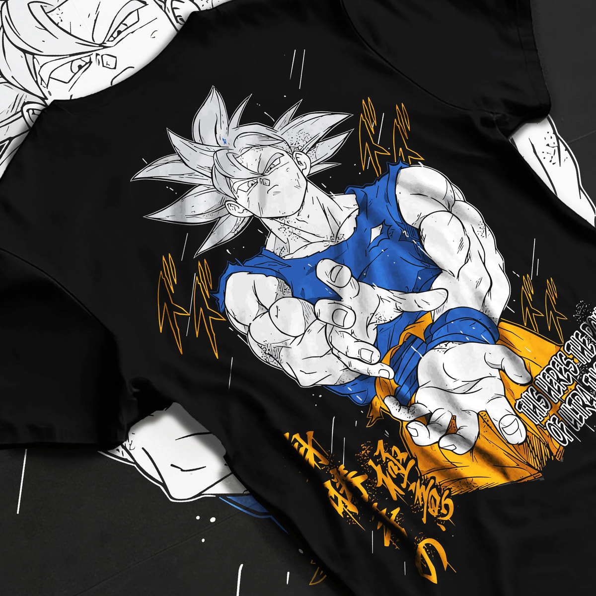 Black T-shirt flat back view showing Son Goku from Dragon Ball: Ultra Instinct white-haired power pose