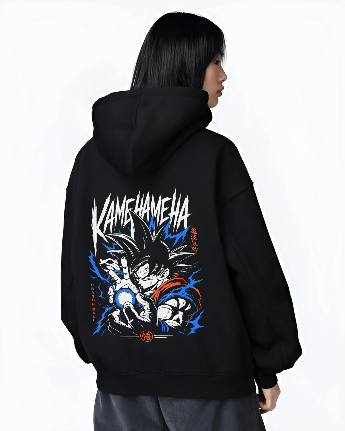 Black hoodie female model back view showing Goku from Dragon Ball: Kamehameha energy attack (black-haired)