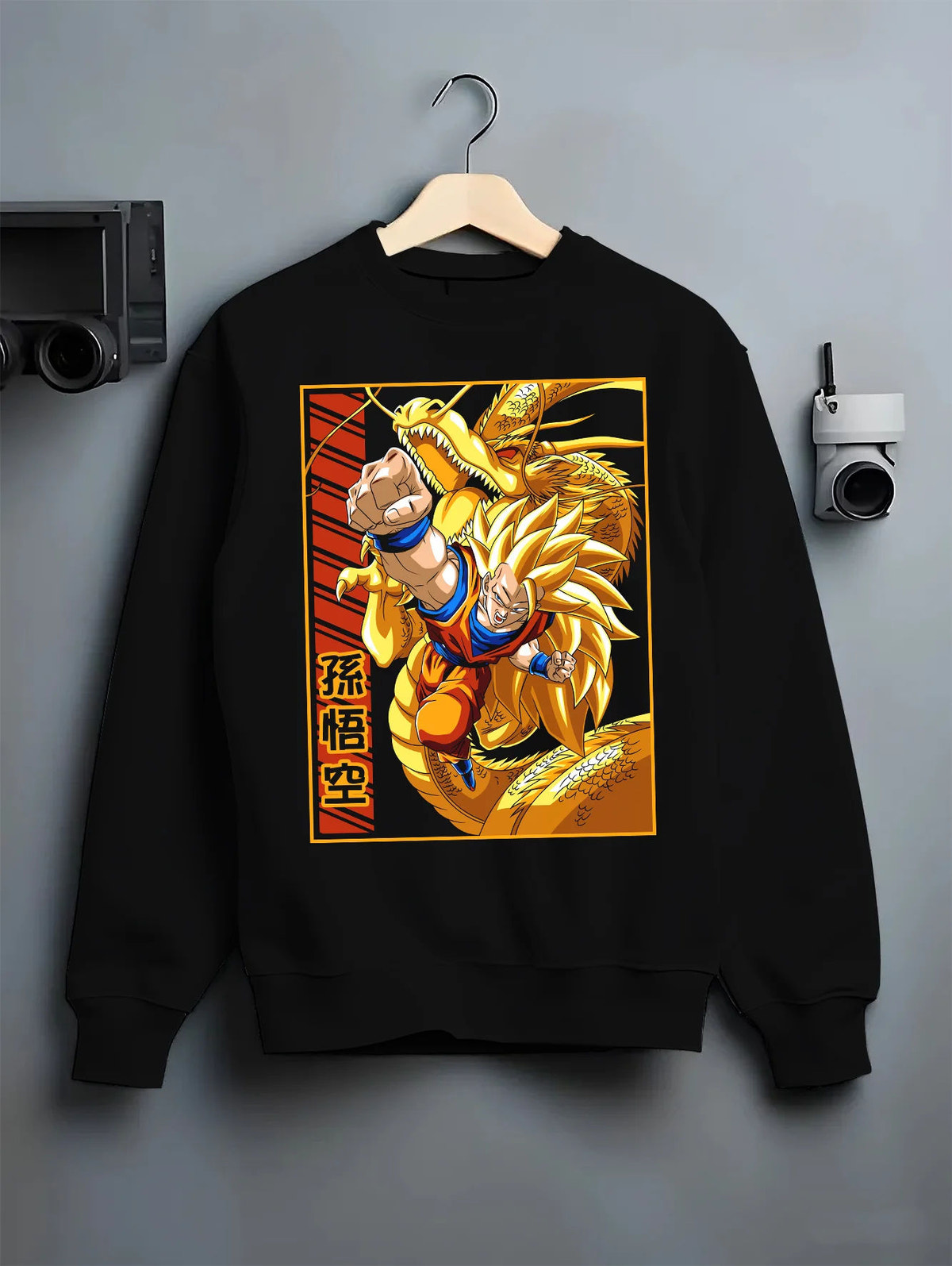 Black crewneck sweatshirt on hanger showing Super Saiyan Goku from Dragon Ball: golden hair with Shenron