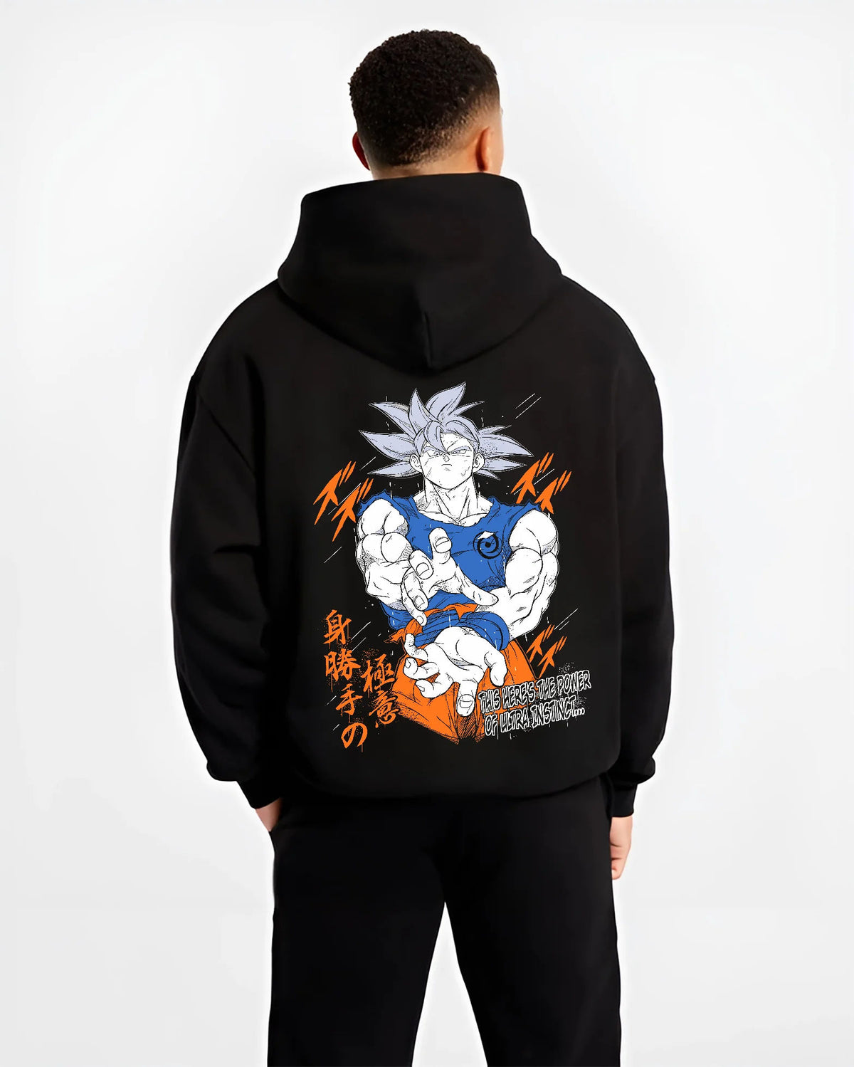 Black hoodie model back view showing Goku from Dragon Ball Super: silver-haired Ultra Instinct poster