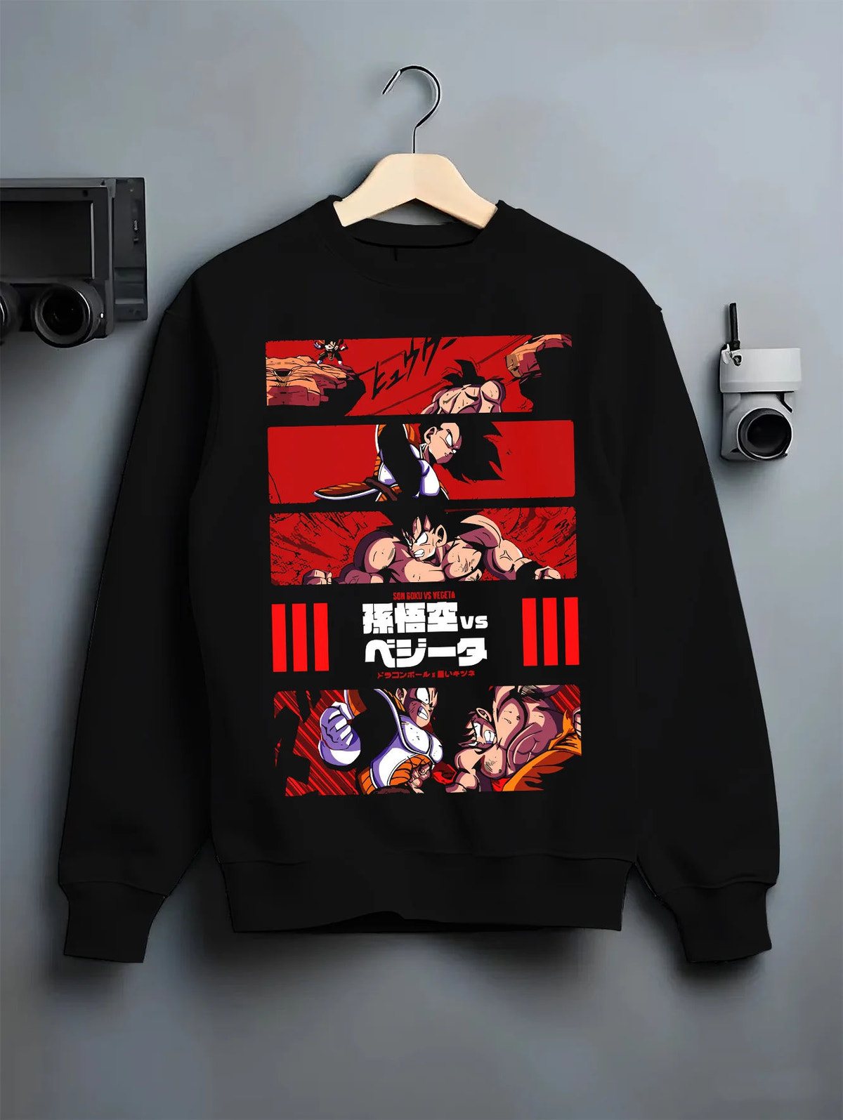Black crewneck sweatshirt on hanger showing Goku vs Vegeta from Dragon Ball Z: battle comparison collage