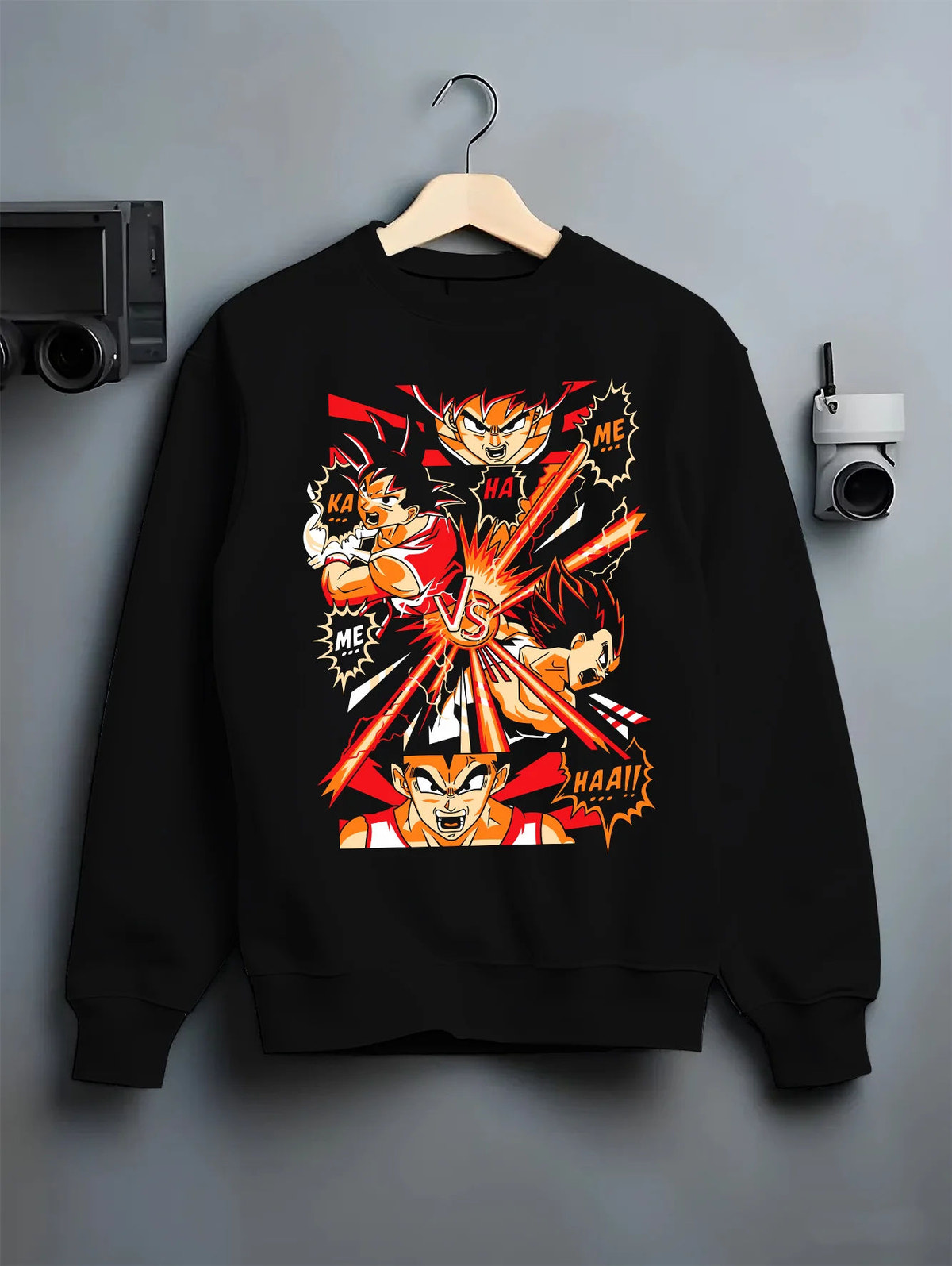 Black crewneck sweatshirt on hanger showing Goku vs Vegeta from Dragon Ball Z: fiery fight panels