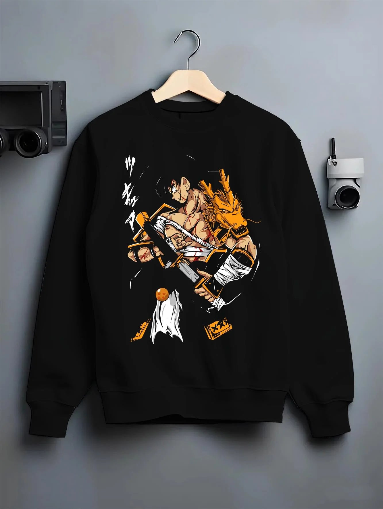 Black crewneck sweatshirt on hanger with Dragon Ball Z Hoodie Goku Vegeta Epic Clash Jumper graphic streetwear graphic.