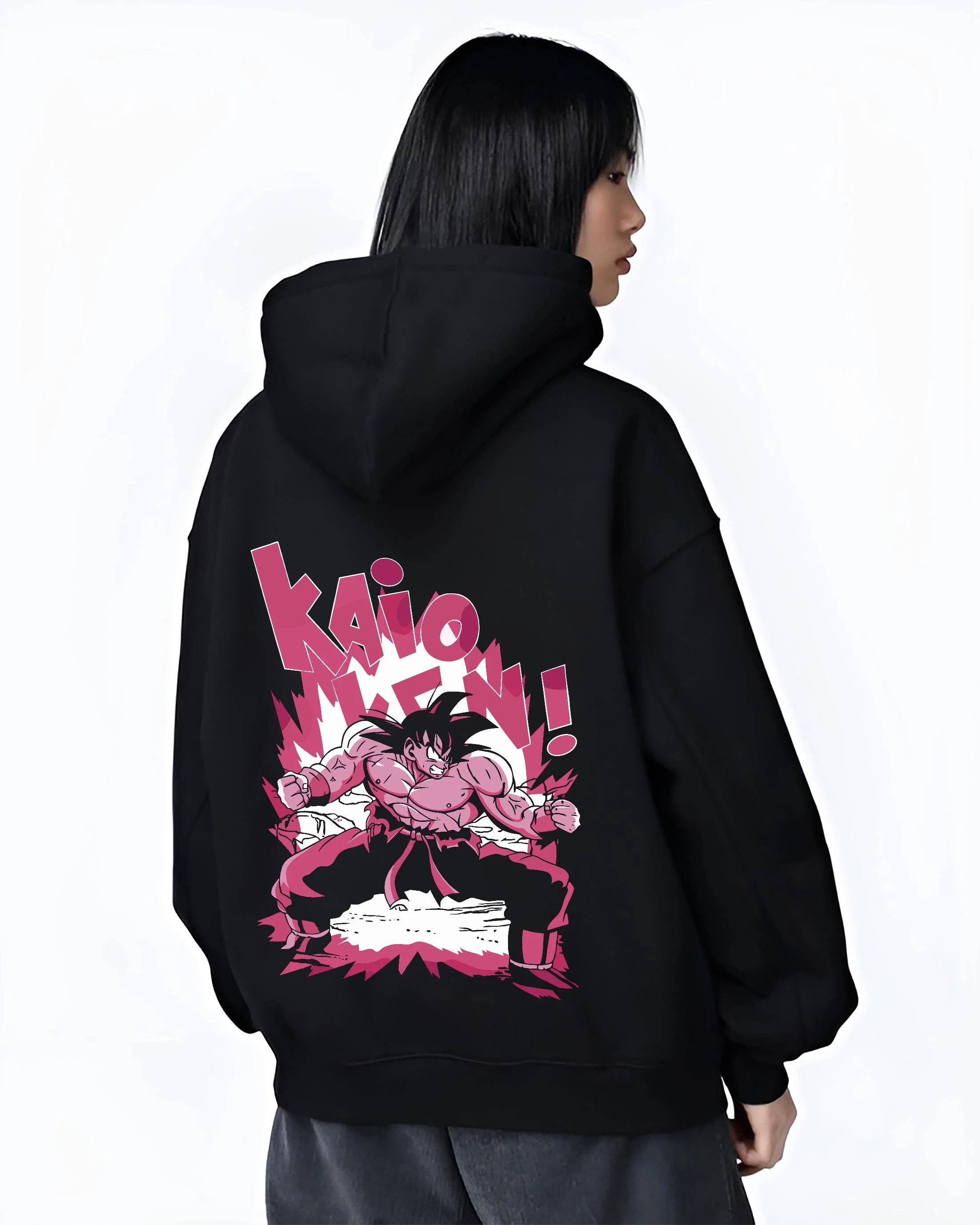Black hoodie worn by female model, back view with Dragon Ball Z Hoodie Goku Kaio Ken Power Jumper graphic Goku themed artwork.