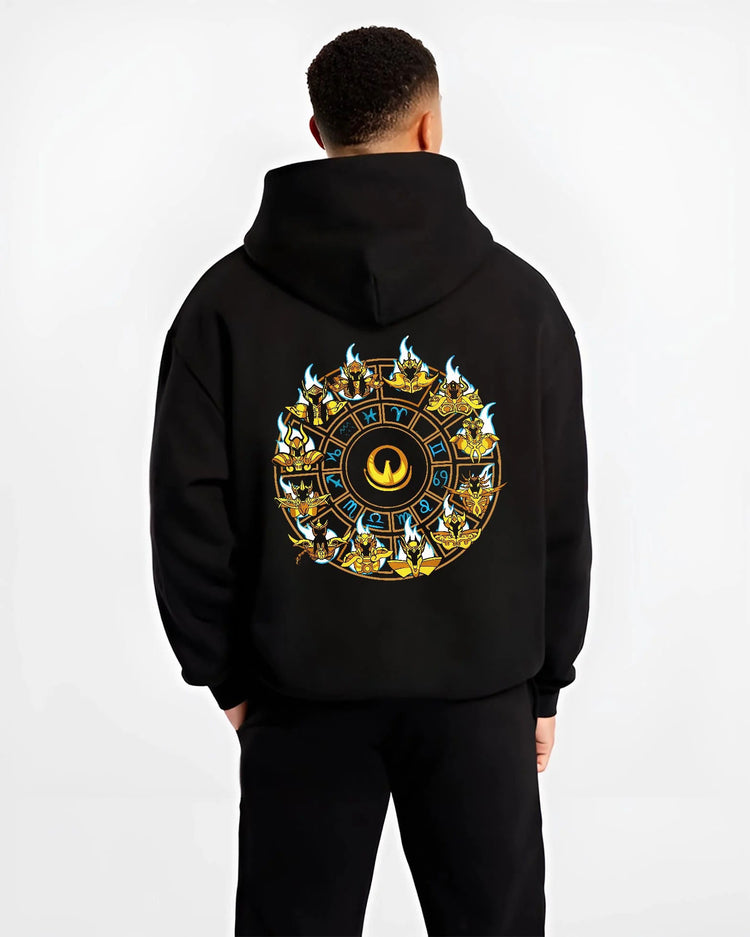 Black hoodie worn by male model from the back featuring Saint Seiya Gold Saints zodiac wheel artwork.