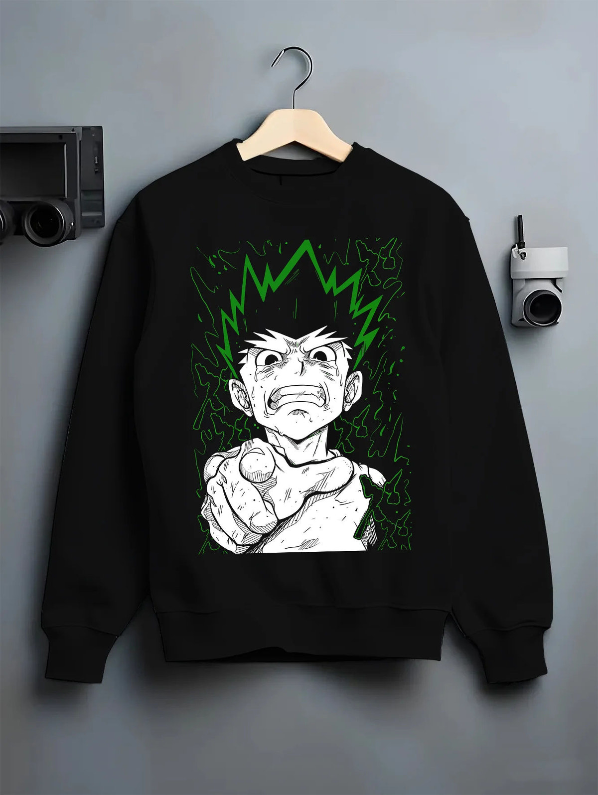 Black crewneck sweatshirt on hanger showing Gon Freecss from Hunter x Hunter: finger-pointing portrait