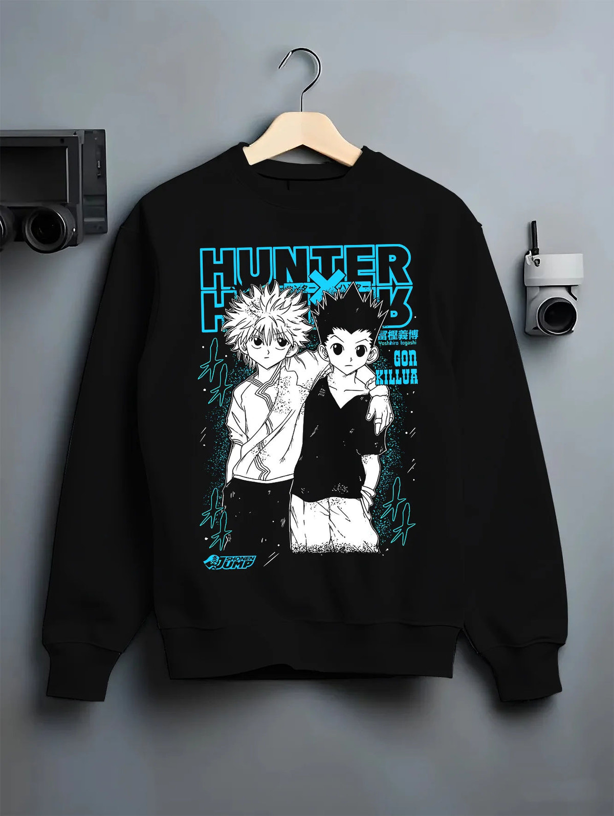 Black crewneck sweatshirt on hanger showing Gon Freecss and Killua Zoldyck from Hunter x Hunter: duo