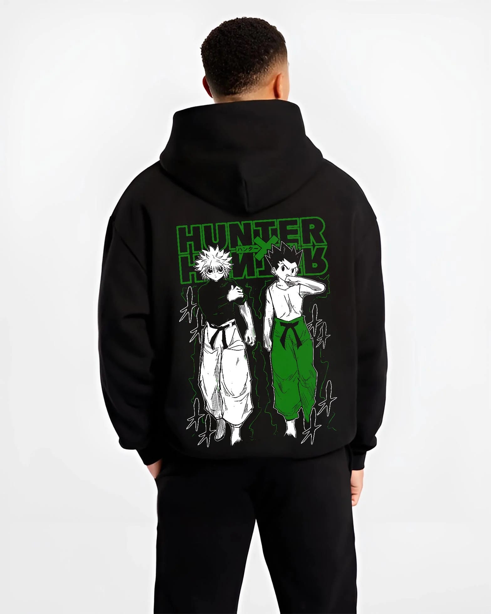 Black hoodie worn by male model, back view with Hunter x Hunter Hoodie Gon Killua Logo Jumper graphic streetwear graphic.