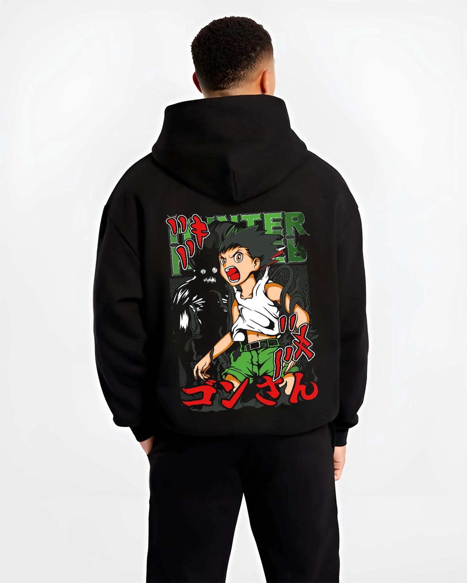 Black hoodie worn by male model, back view with Hunter x Hunter Hoodie Gon Freecss Power Jumper graphic streetwear graphic.