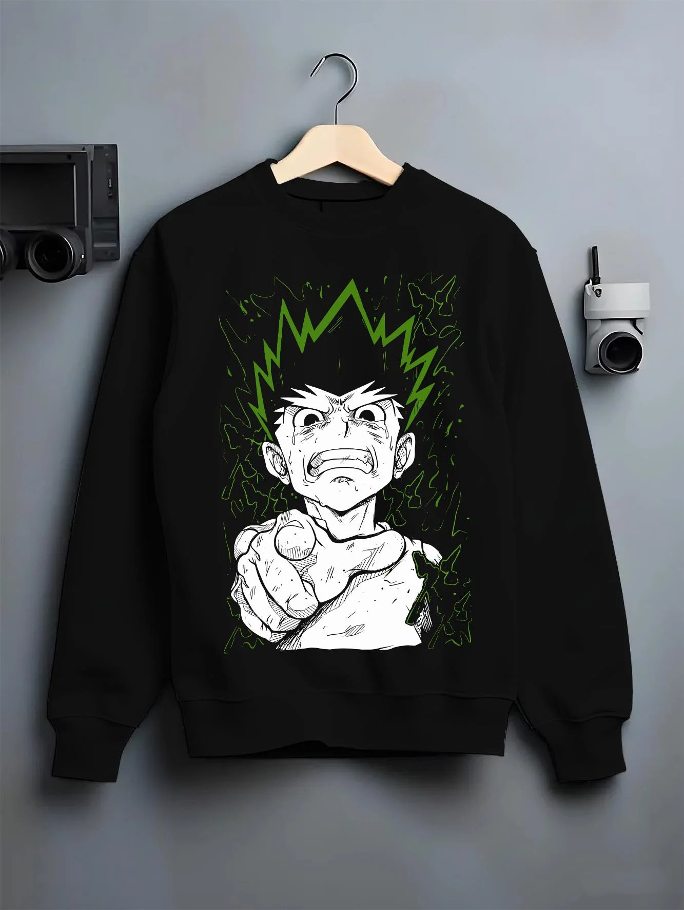 Black crewneck sweatshirt on hanger with Hunter x Hunter Hoodie Gon Freecss Strong Punch Jumper graphic premium wear.