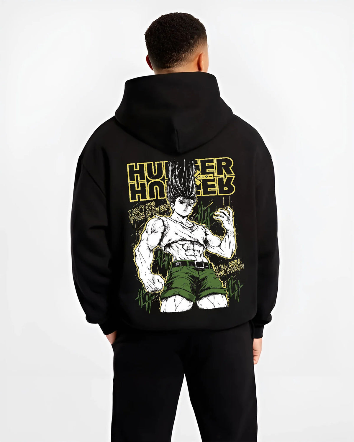 Black hoodie model back view showing Gon Freecss from Hunter x Hunter: adult transformation