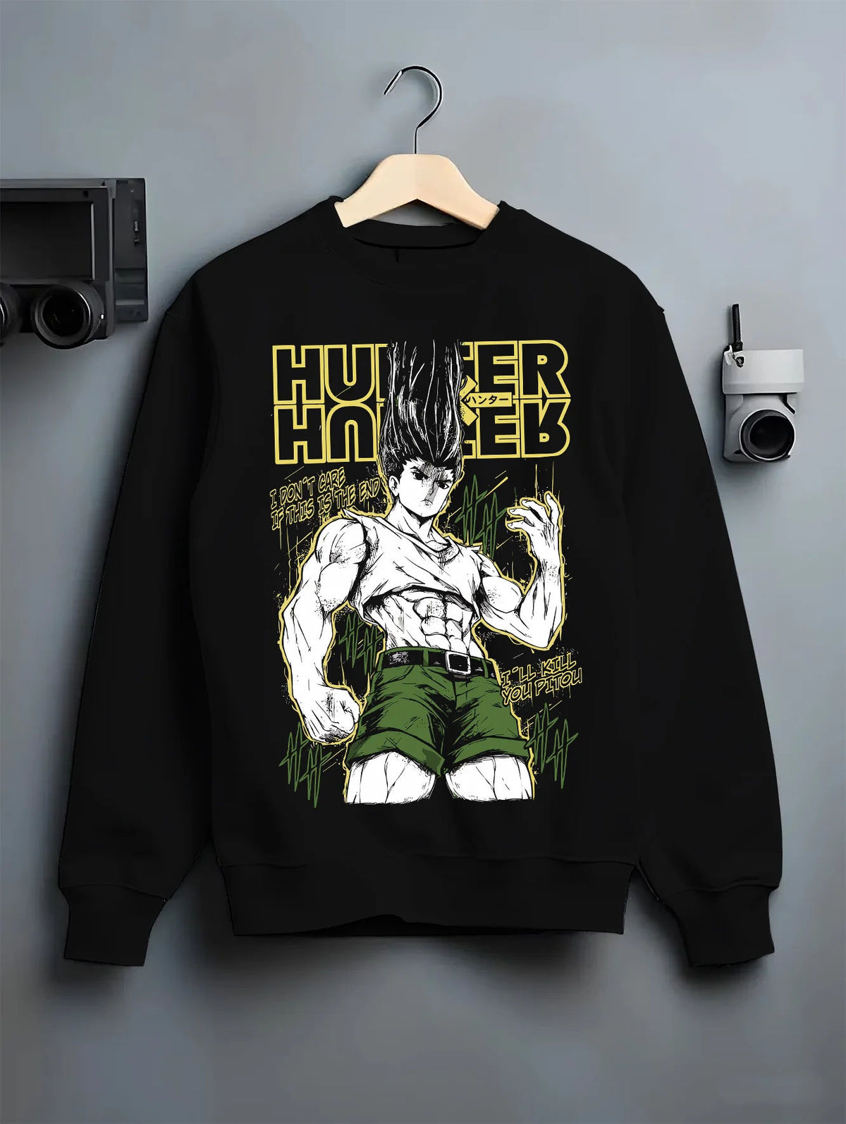 Black crewneck sweatshirt on hanger showing Gon Freecss from Hunter x Hunter: adult transformation