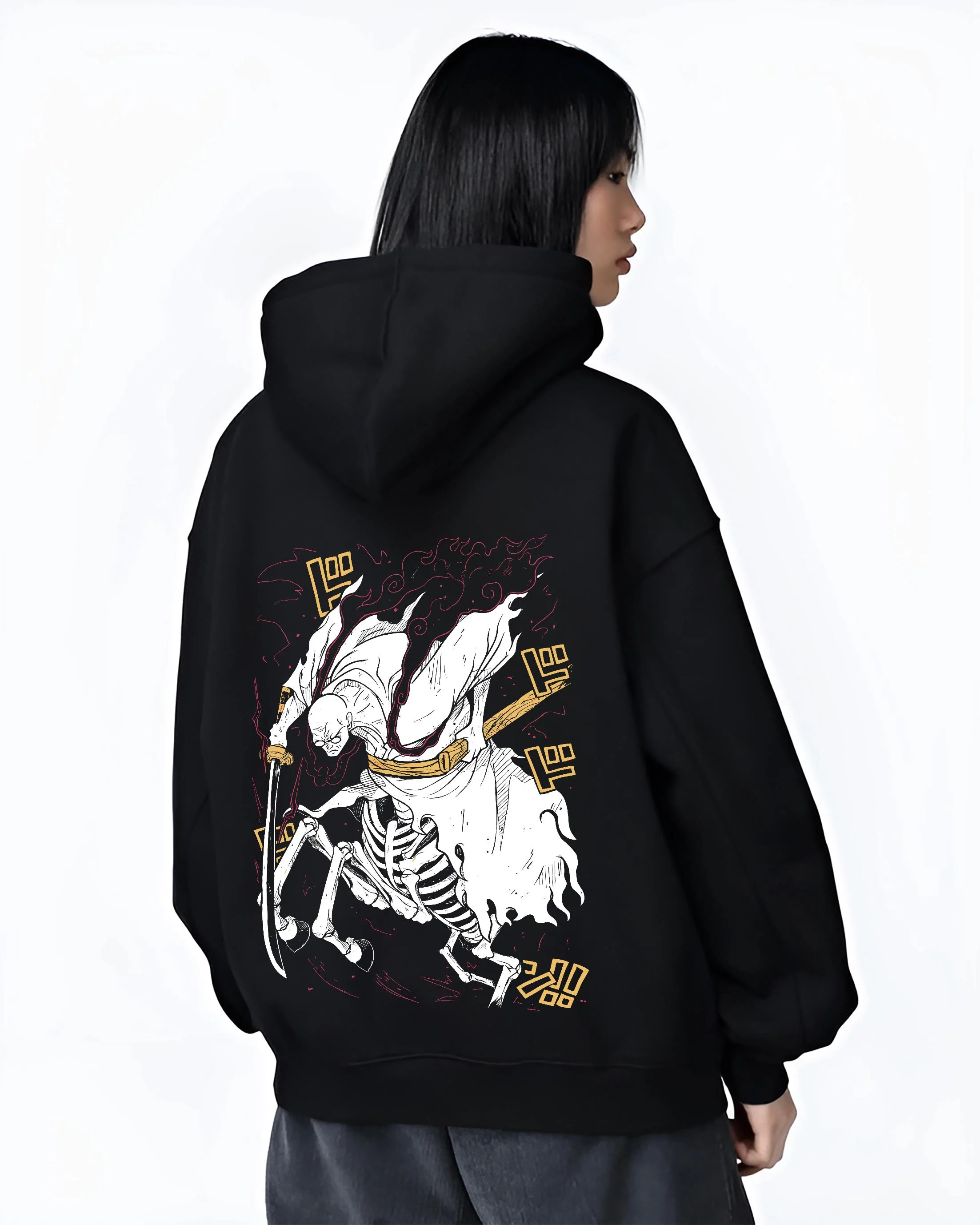 Black hoodie worn by female model, back view with One Piece Hoodie Brook Soul King Rising Jumper graphic premium wear.