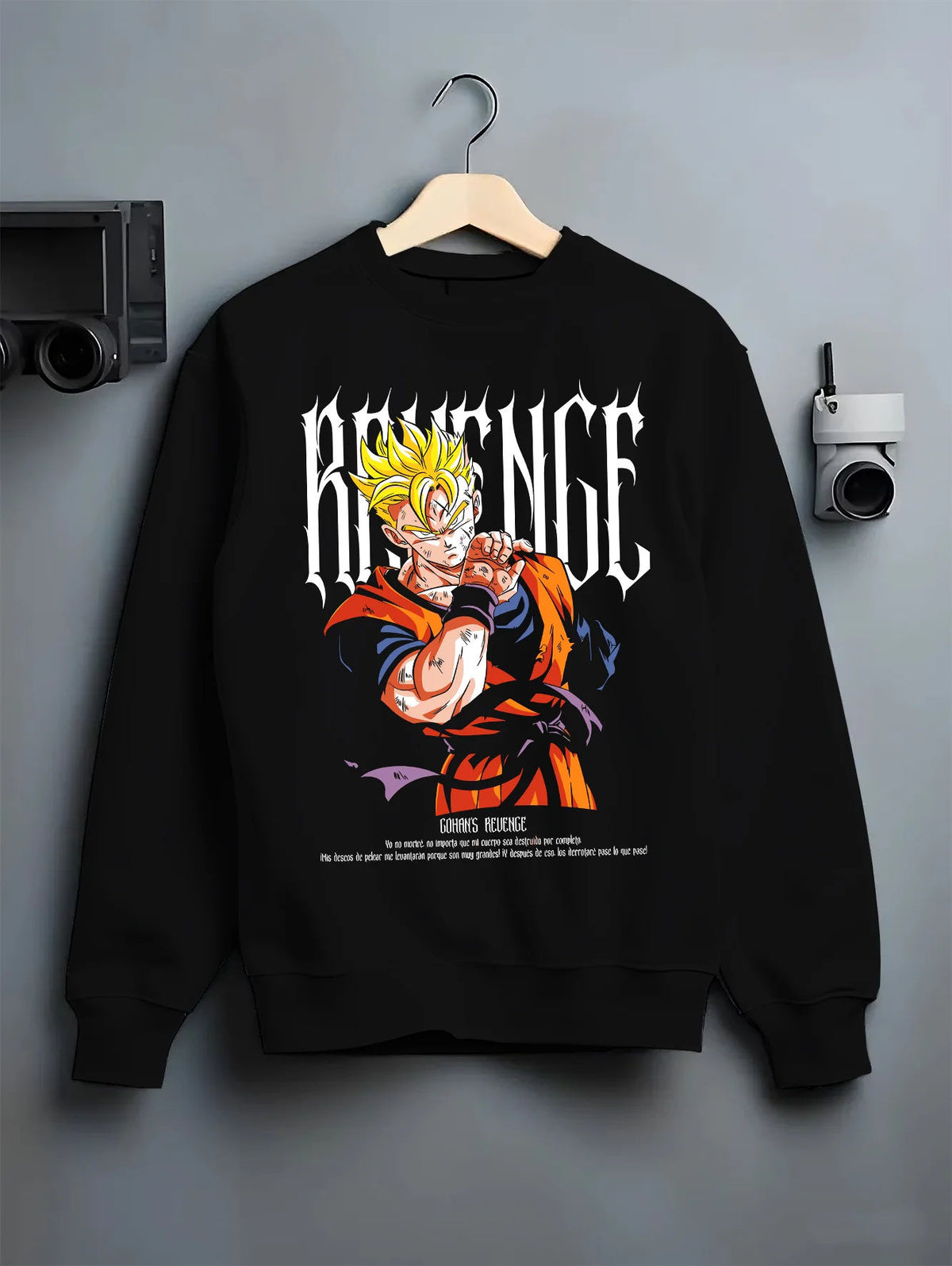 Black crewneck sweatshirt on hanger showing Super Saiyan Goku from Dragon Ball: golden power pose