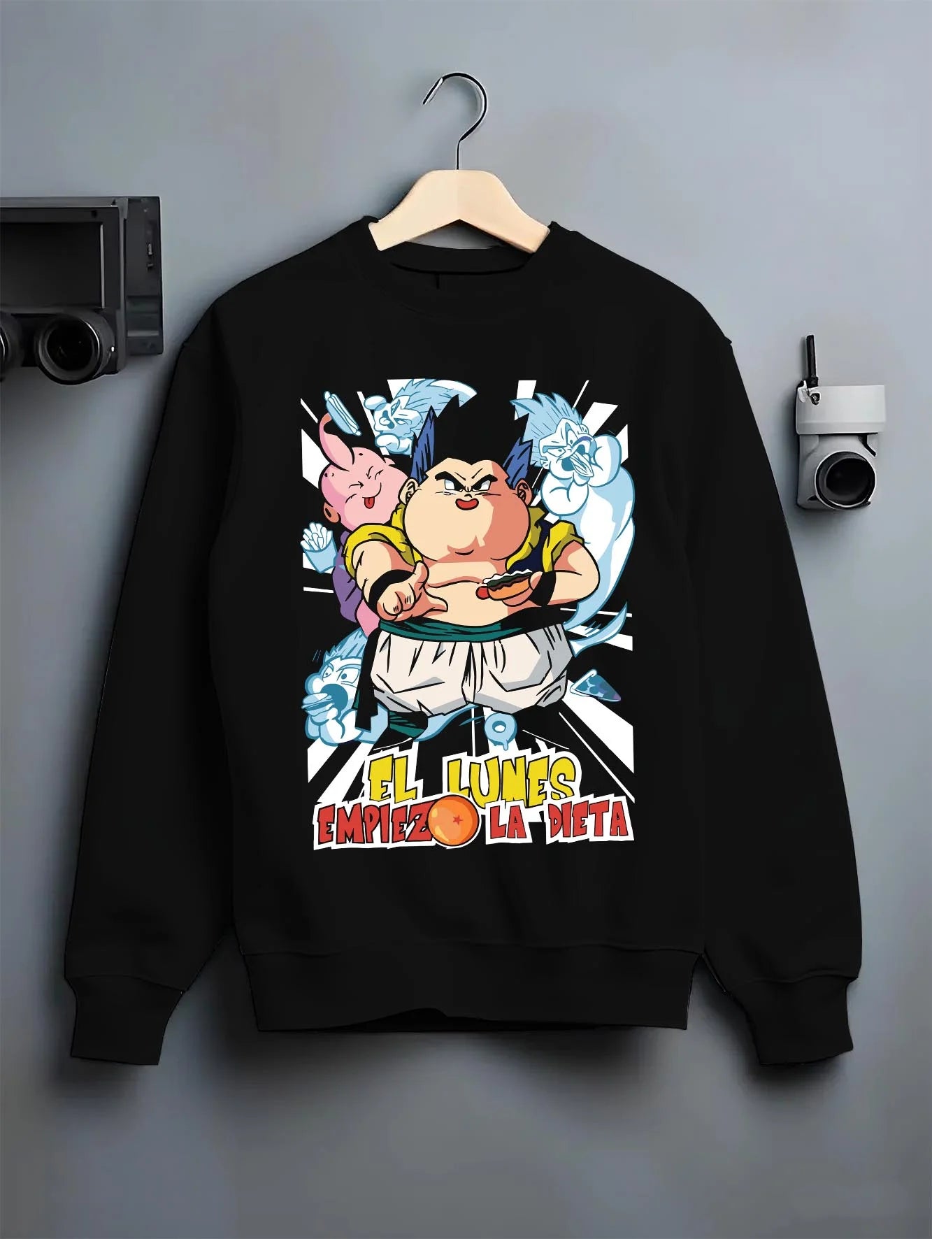 Black crewneck sweatshirt on hanger with Dragon Ball Z Hoodie Gotenks Fusion Power Jumper graphic bold anime graphic.