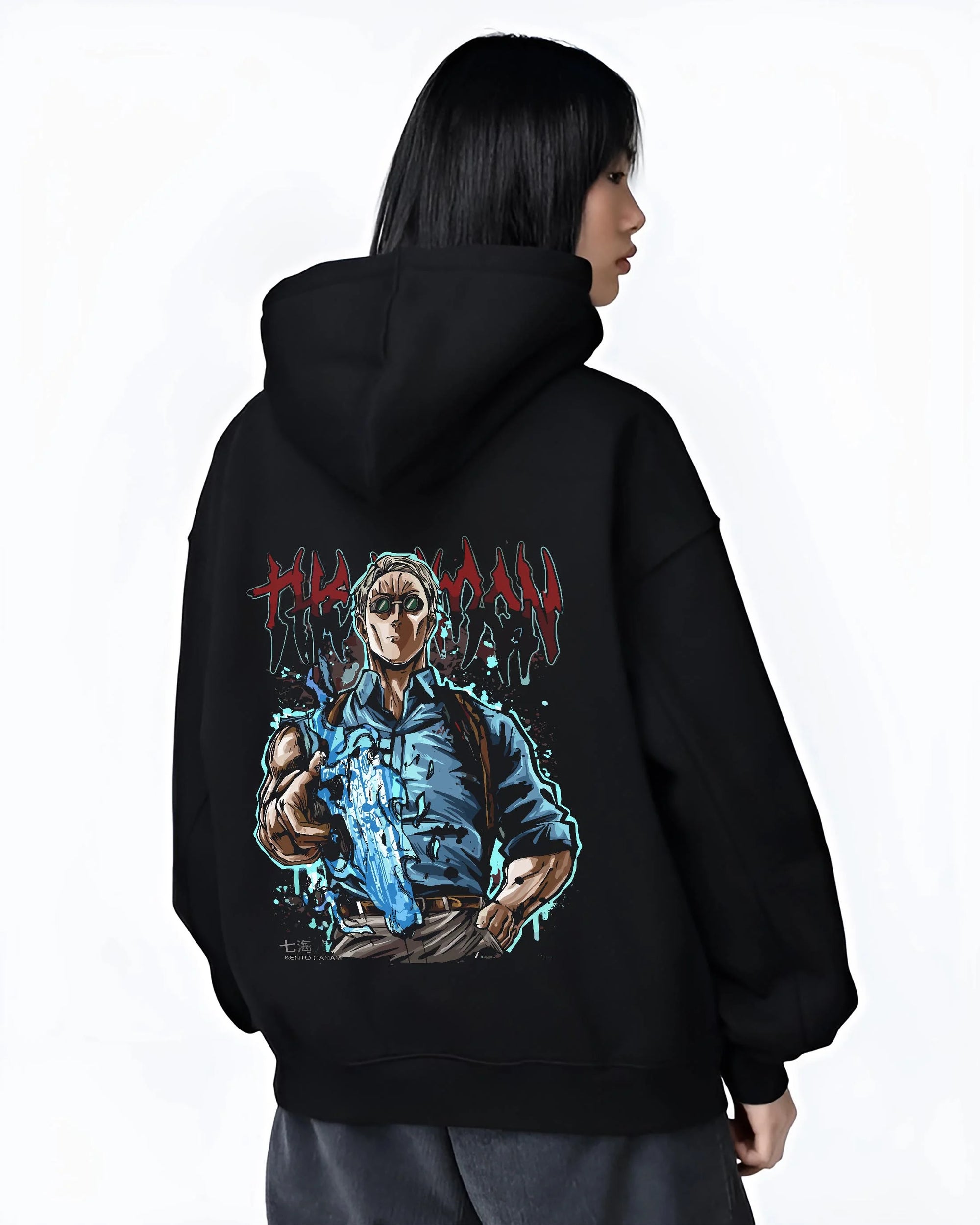 Black hoodie worn by female model, back view, featuring retro streetwear graphic of Nanami Kento with cursed blade artwork.