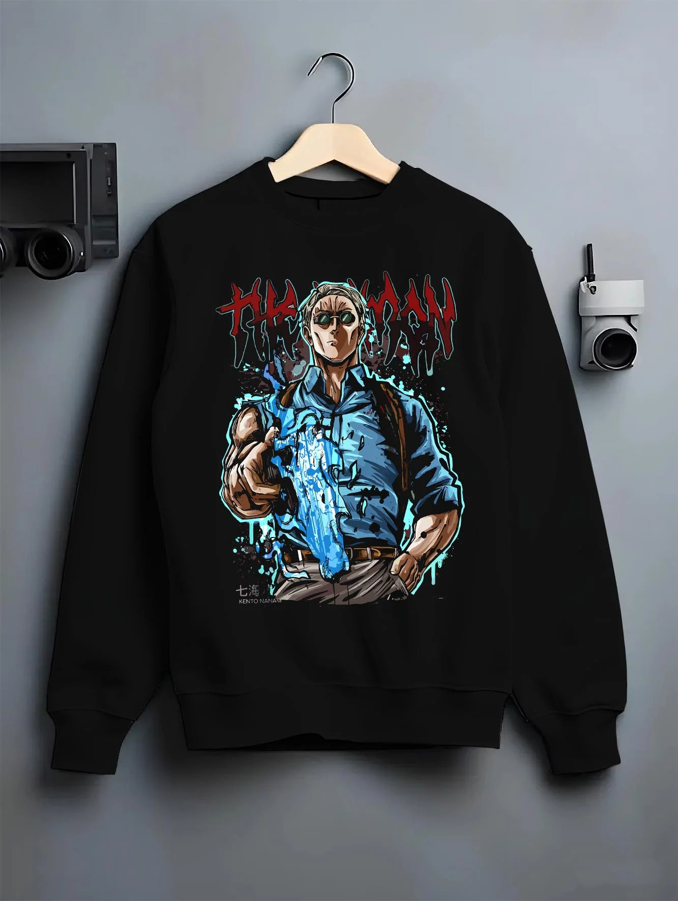 Black crewneck sweatshirt on hanger, featuring shonen battle character artwork of Nanami Kento from Jujutsu Kaisen.