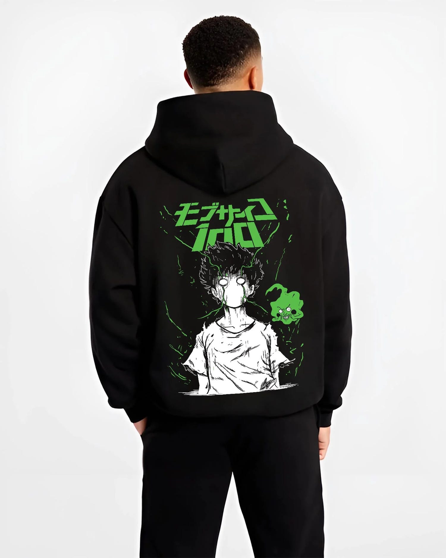 Black hoodie worn by male model, back view with Mob Psycho 100 Hoodie Green Esper Spirit Jumper graphic bold anime graphic.