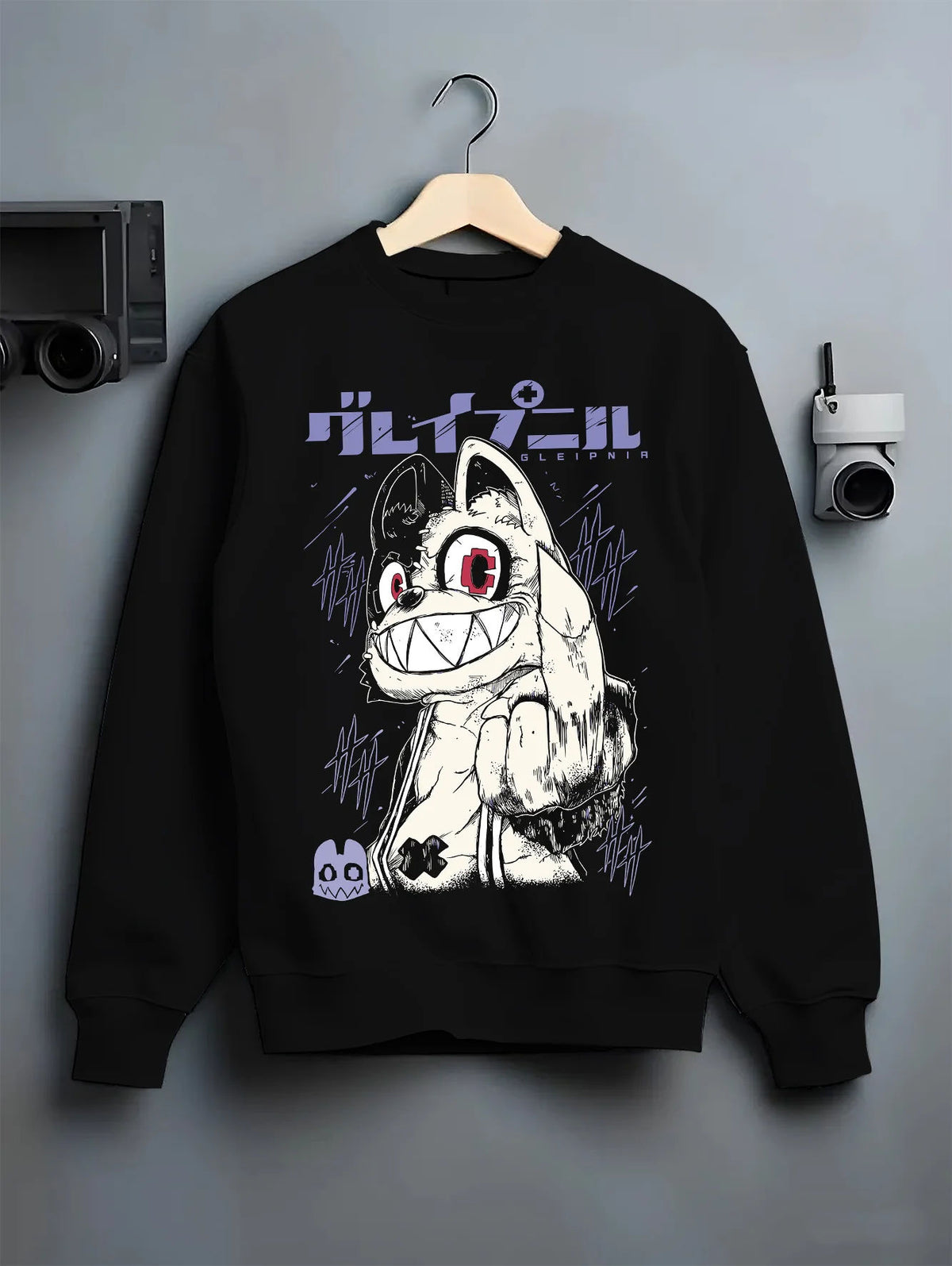 Black crewneck sweatshirt on hanger showing Gremlin / Stripe-like creature from Gremlins: Gremlins movie character