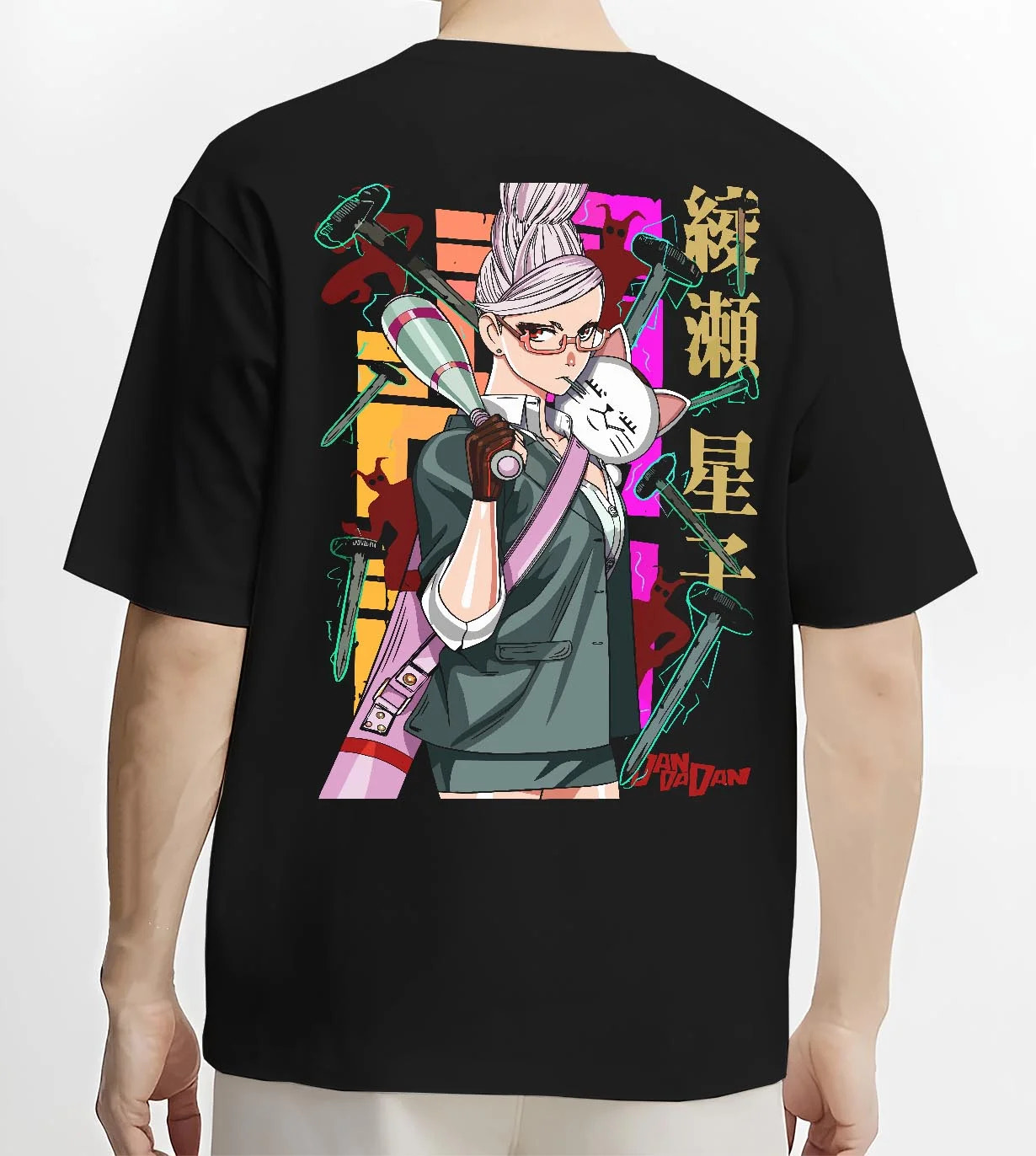 Black T-shirt worn by a male model, back view, featuring Aira Shiratori Dandadan shonen battle character artwork with hammer weapons.