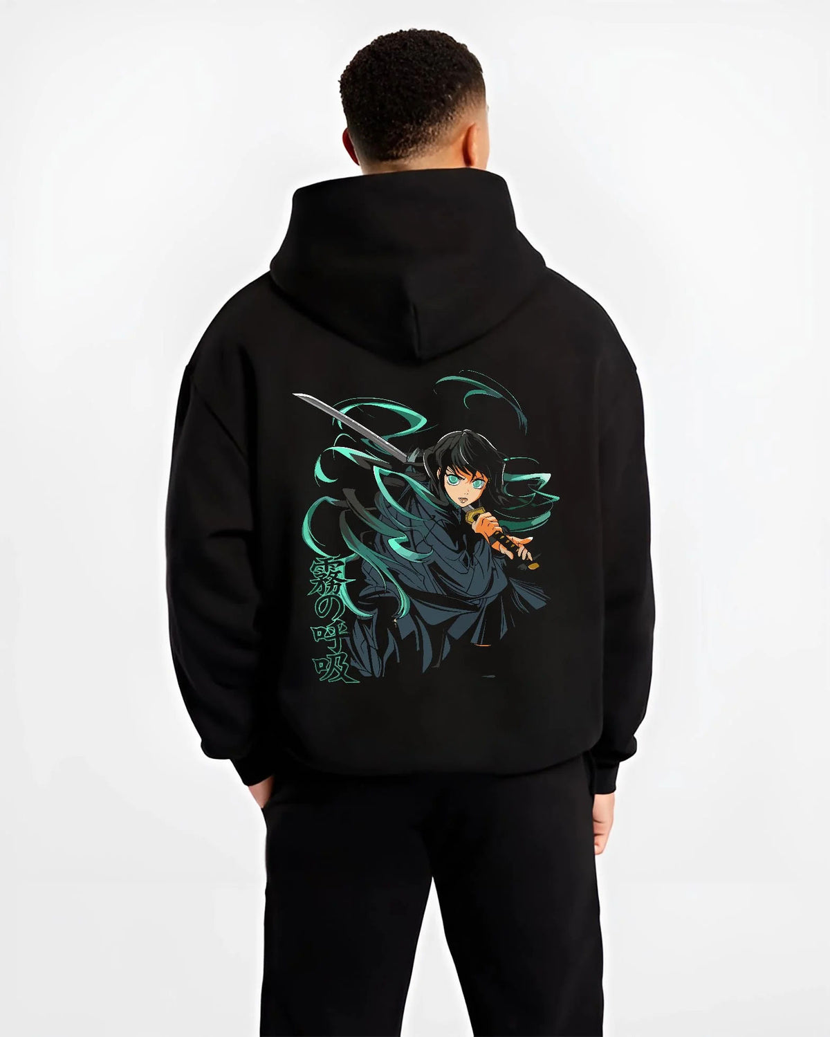 Black hoodie worn by male model from the back featuring Muichiro Tokito Mist Hashira sword artwork.