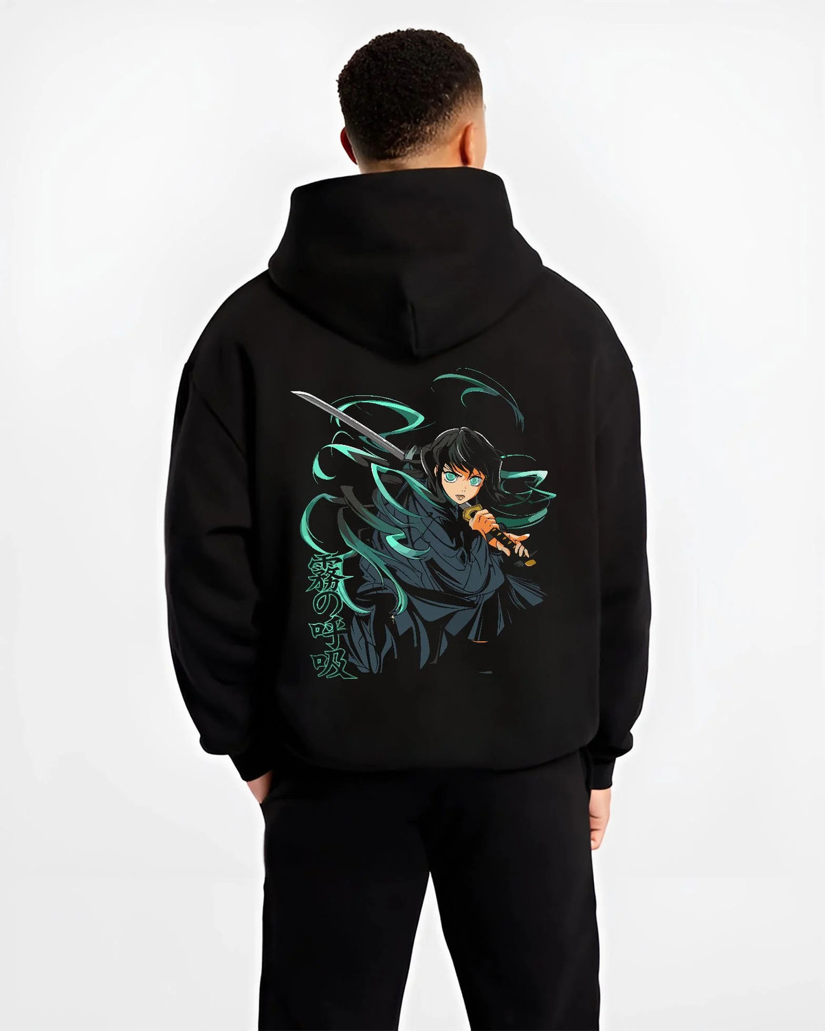 Black hoodie worn by male model from the back featuring Muichiro Tokito Mist Hashira sword artwork.