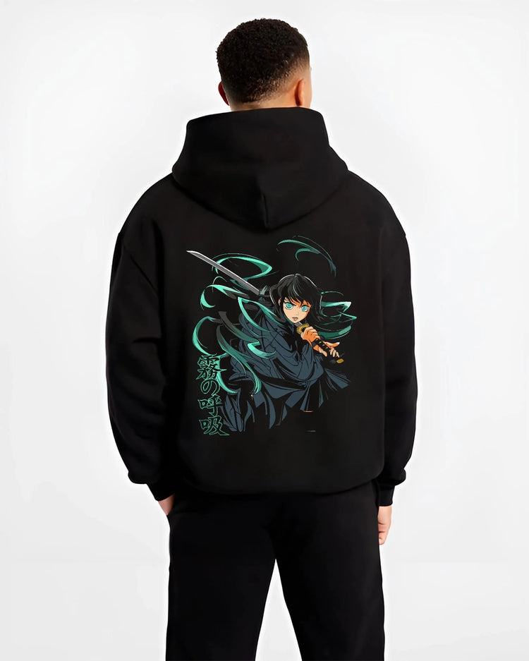 Black hoodie worn by male model from the back featuring Muichiro Tokito Mist Hashira sword artwork.