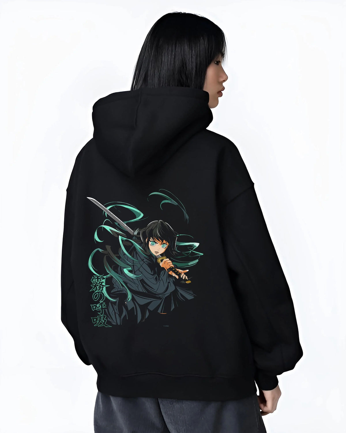 Black hoodie worn by female model from the back featuring Muichiro Tokito Mist Hashira sword artwork.