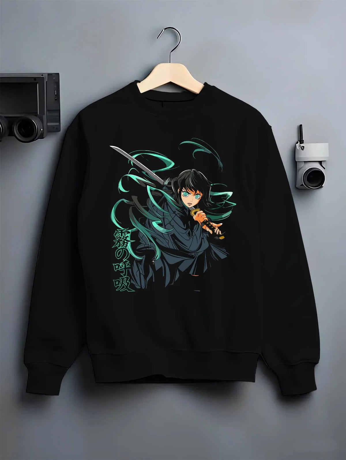 Black crewneck sweatshirt on hanger featuring Muichiro Tokito Mist Hashira sword artwork.