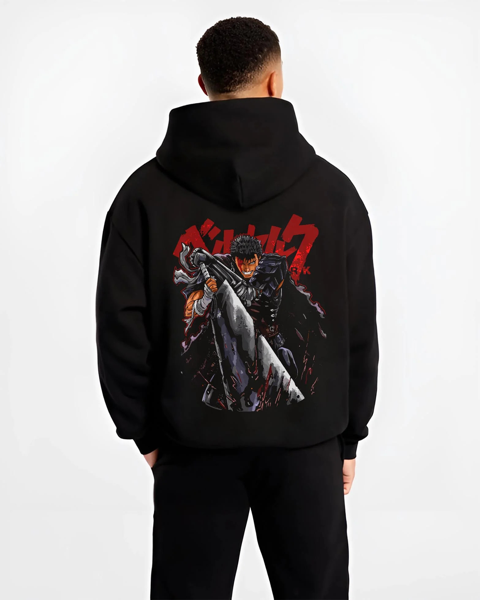 Black hoodie worn by male model, back view with Guts Berserk Warrior Hoodie Dark Fantasy Retro Anime graphic streetwear graphic.