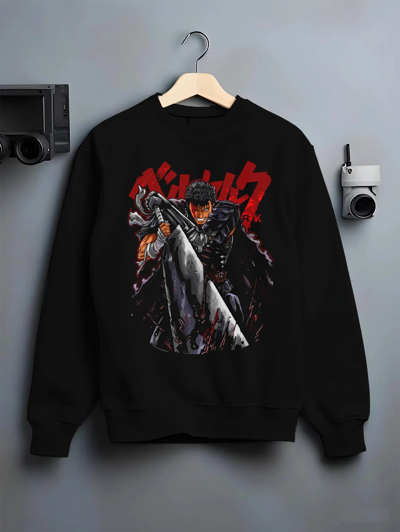 Black crewneck sweatshirt on hanger with Guts Berserk Warrior Hoodie Dark Fantasy Retro Anime graphic premium wear.