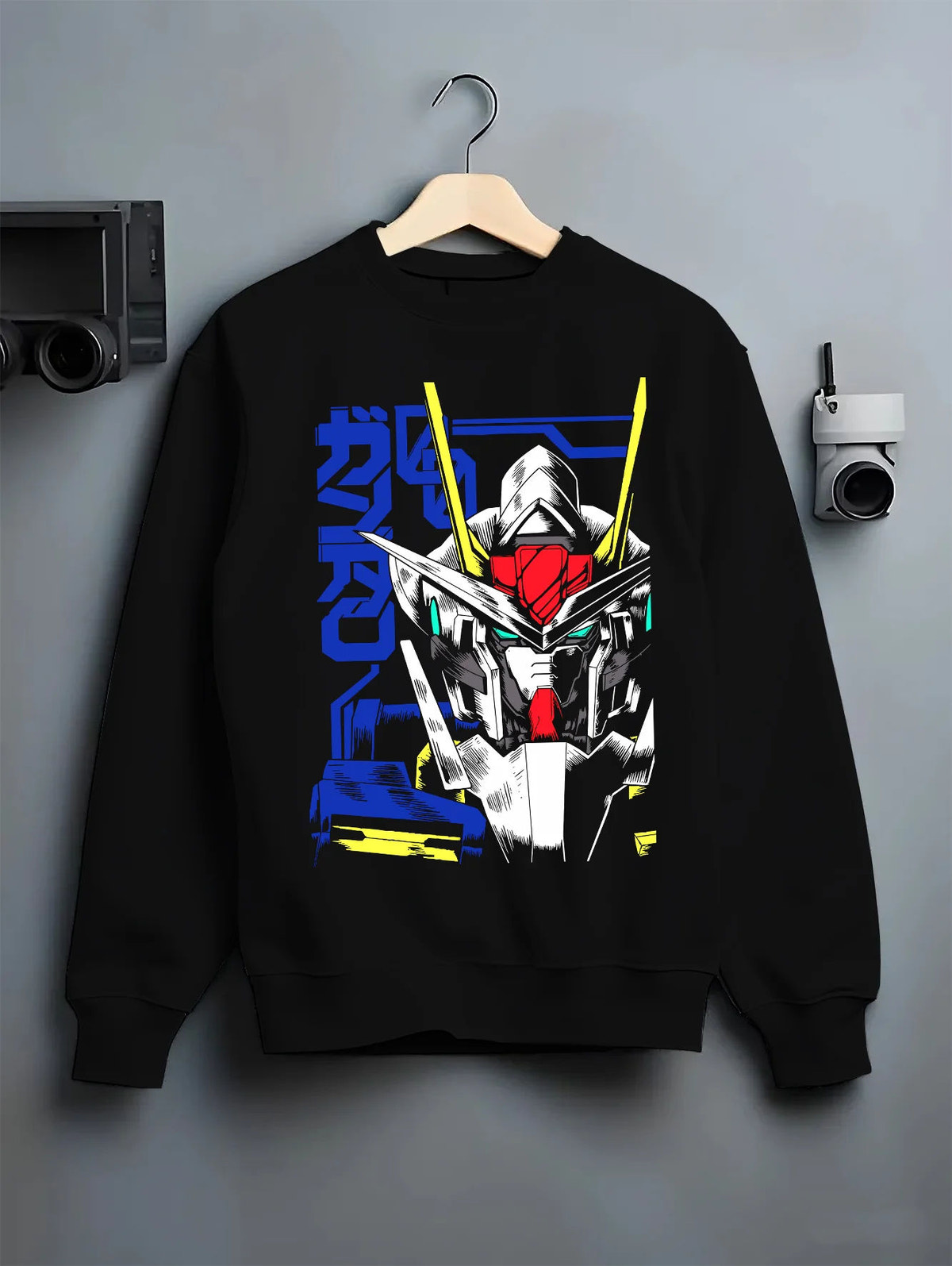 Black crewneck sweatshirt on hanger showing Gundam from Mobile Suit Gundam: white mecha head blue technical poster