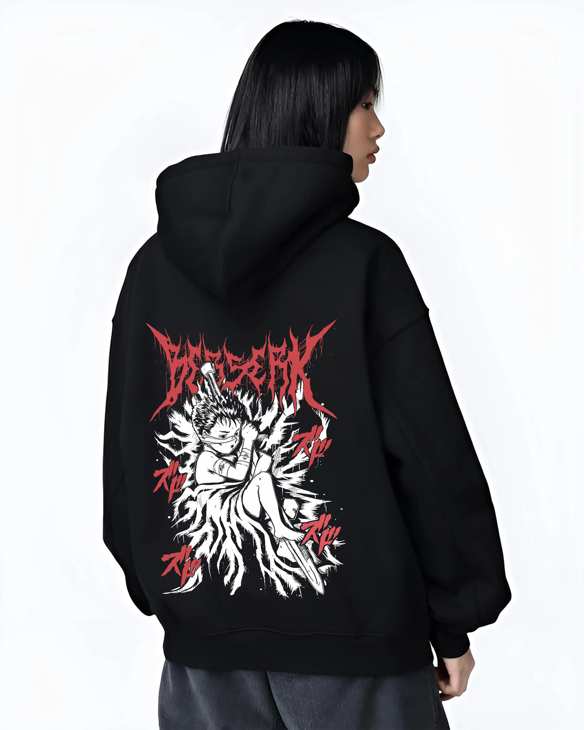 Black hoodie female model back view showing Guts from Berserk: Berserker Armour combat stance
