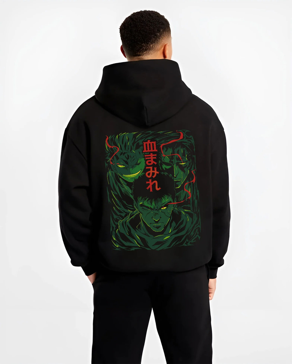 Black hoodie model back view with Berserk dark-haired warrior in green/red portrait illustrated back graphic