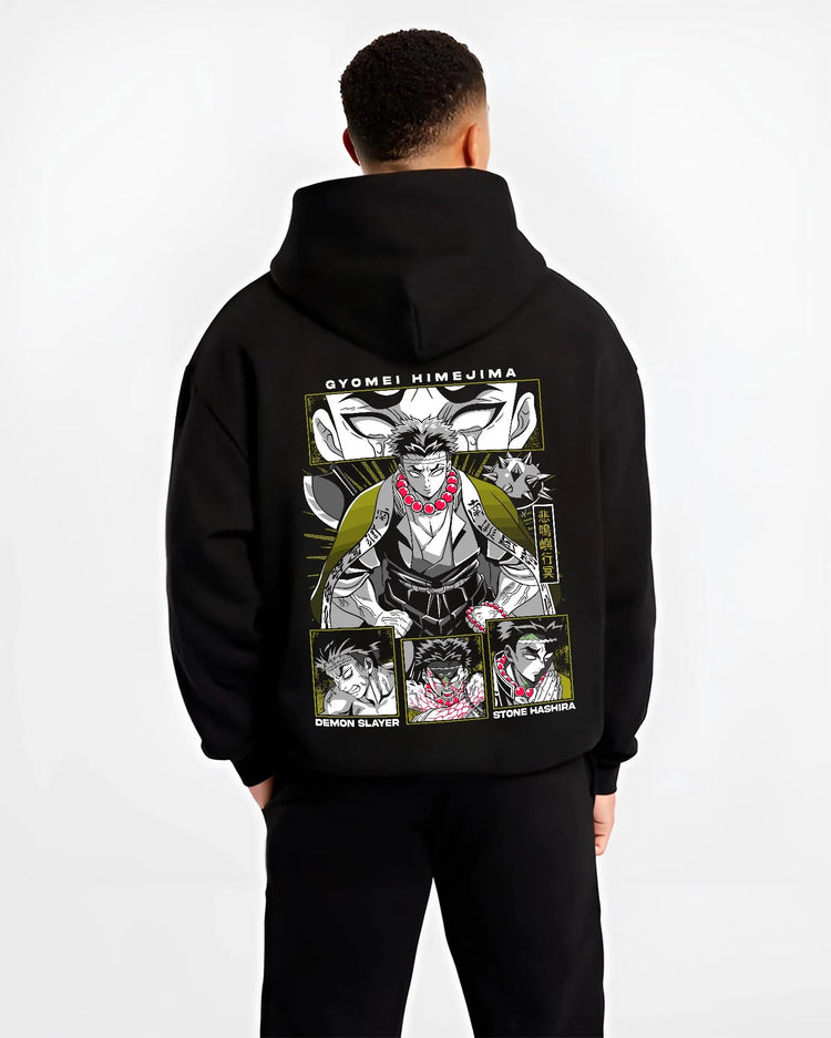 Black hoodie worn by male model, back view with Demon Slayer Hoodie Gyomei Himejima Stone Hashira graphic premium wear.