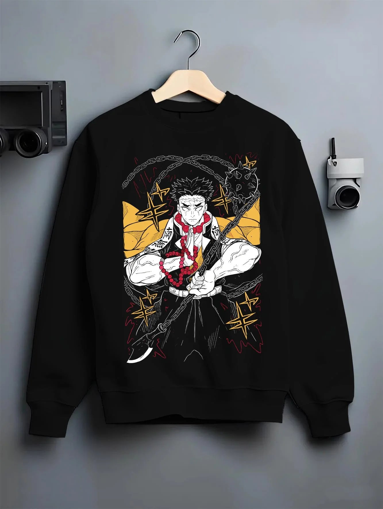 Black crewneck sweatshirt on hanger with Demon Slayer Hoodie Gyomei Himejima Prayer Pose Jumper graphic streetwear graphic.