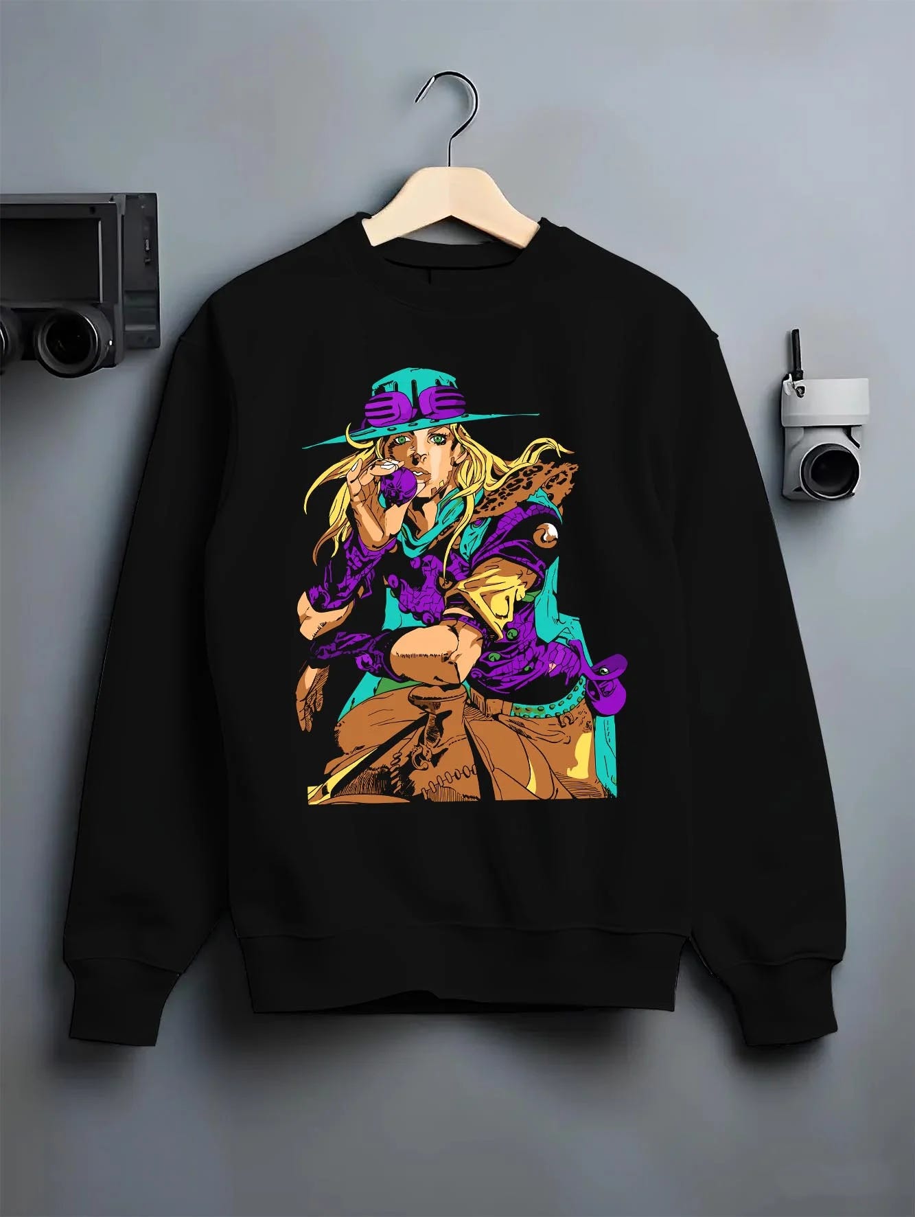Black crewneck sweatshirt on hanger with JoJo’s Bizarre Adventure Hoodie Gyro Zeppeli Jumper graphic streetwear graphic.