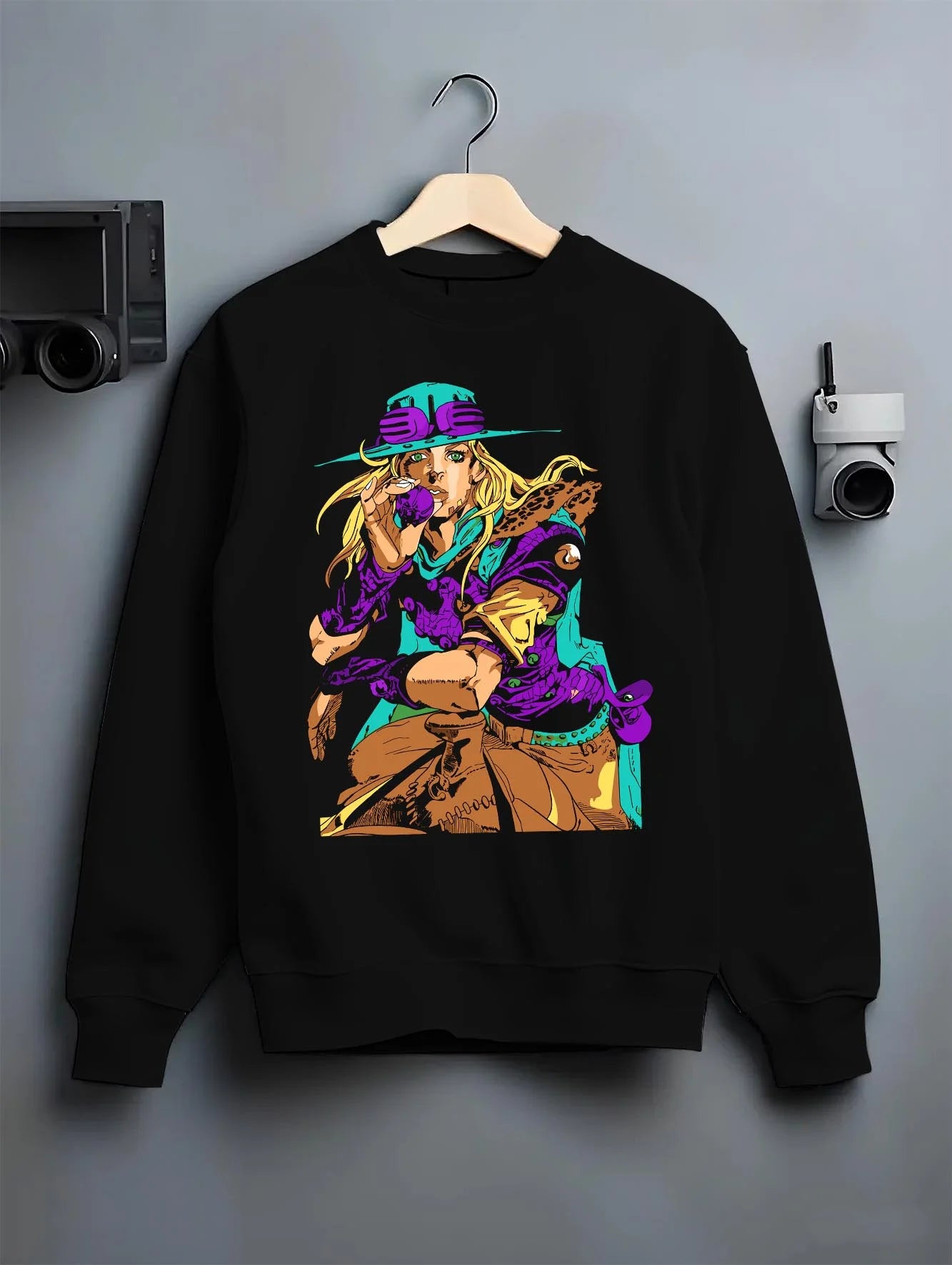 Black crewneck sweatshirt on hanger with JoJo’s Bizarre Adventure Hoodie Gyro Zeppeli Jumper graphic streetwear graphic.